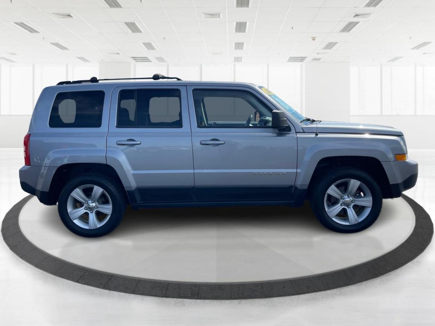 2014 Bright Silver Metallic CC Jeep Patriot Latitude 4WD (1C4NJRFB2ED) with an 2.4L L4 DOHC 16V engine, located at 1951 S Dayton Lakeview Rd., New Carlisle, OH, 45344, (937) 908-9800, 39.890999, -84.050255 - Photo#1