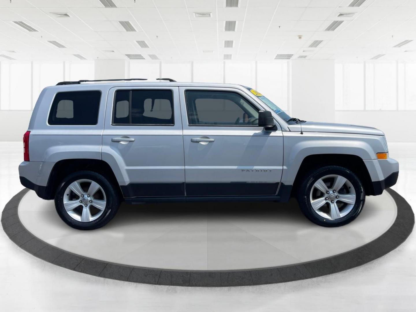 2014 Bright Silver Metallic CC Jeep Patriot (1C4NJPFA5ED) with an 2.0L L4 DOHC 16V engine, located at 1951 S Dayton Lakeview Rd., New Carlisle, OH, 45344, (937) 908-9800, 39.890999, -84.050255 - Photo#1