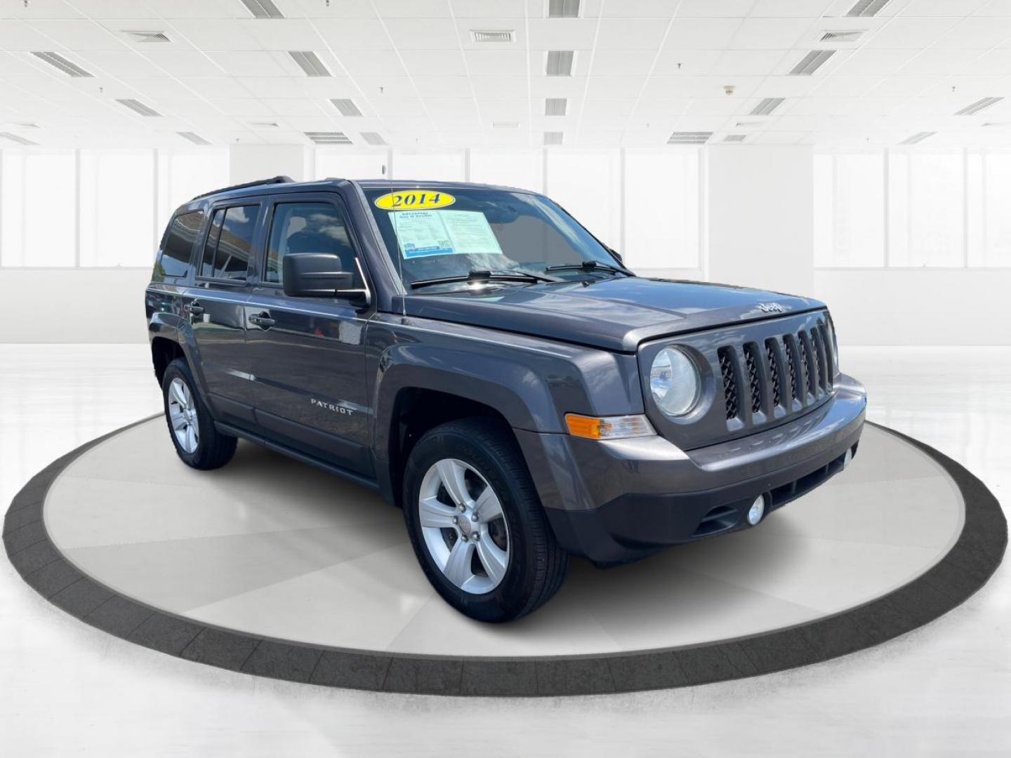 2014 Granite Crystal Met CC Jeep Patriot Sport 4WD (1C4NJRBB8ED) with an 2.4L L4 DOHC 16V engine, located at 401 Woodman Dr, Riverside, OH, 45431, (937) 908-9800, 39.760899, -84.123421 - Photo#0