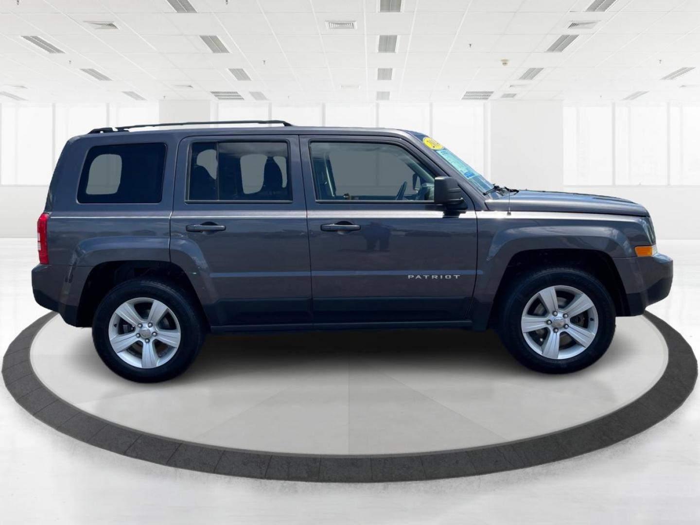 2014 Granite Crystal Met CC Jeep Patriot Sport 4WD (1C4NJRBB8ED) with an 2.4L L4 DOHC 16V engine, located at 401 Woodman Dr, Riverside, OH, 45431, (937) 908-9800, 39.760899, -84.123421 - Photo#1