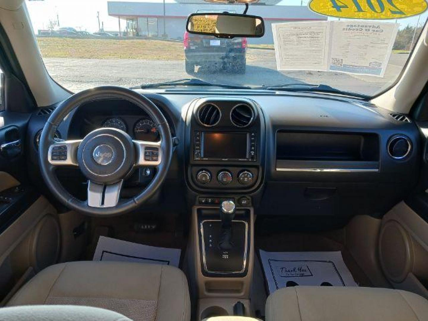 2014 Black Clearcoat Jeep Patriot Latitude 4WD (1C4NJRFB8ED) with an 2.4L L4 DOHC 16V engine, located at 401 Woodman Dr, Riverside, OH, 45431, (937) 908-9800, 39.760899, -84.123421 - Photo#7