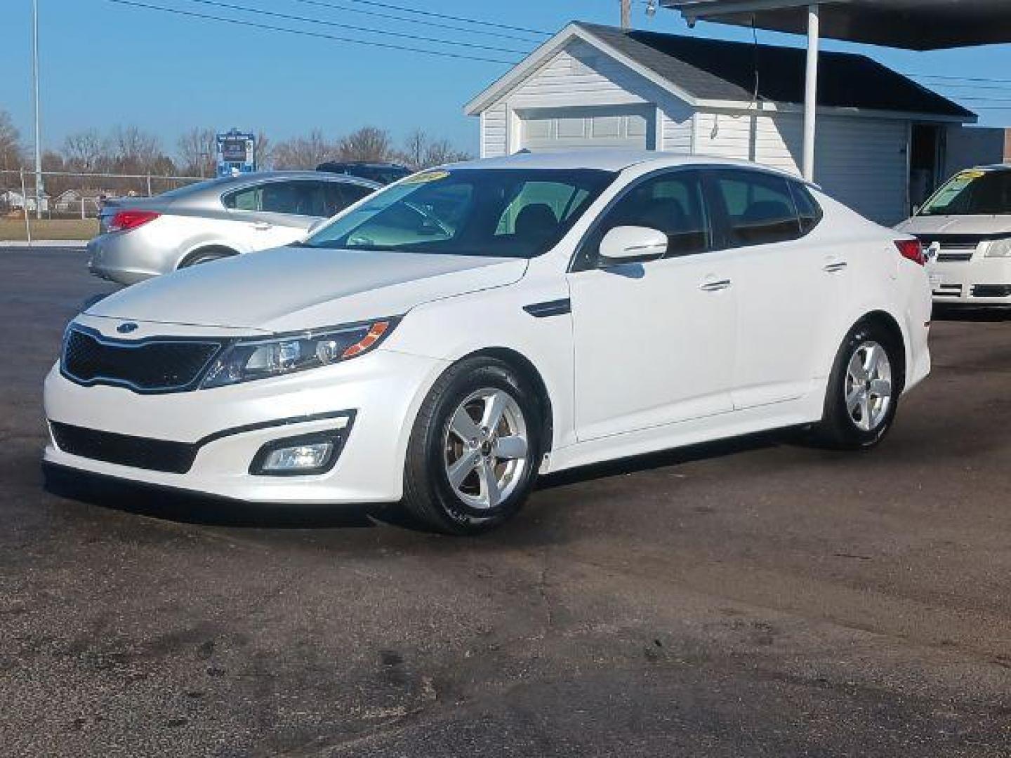 2014 Snow White Pearl Kia Optima LX (5XXGM4A71EG) with an 2.4L L4 DOHC 16V engine, 6-Speed Automatic transmission, located at 1099 N County Rd 25A , Troy, OH, 45373, (937) 908-9800, 40.057079, -84.212883 - Photo#2