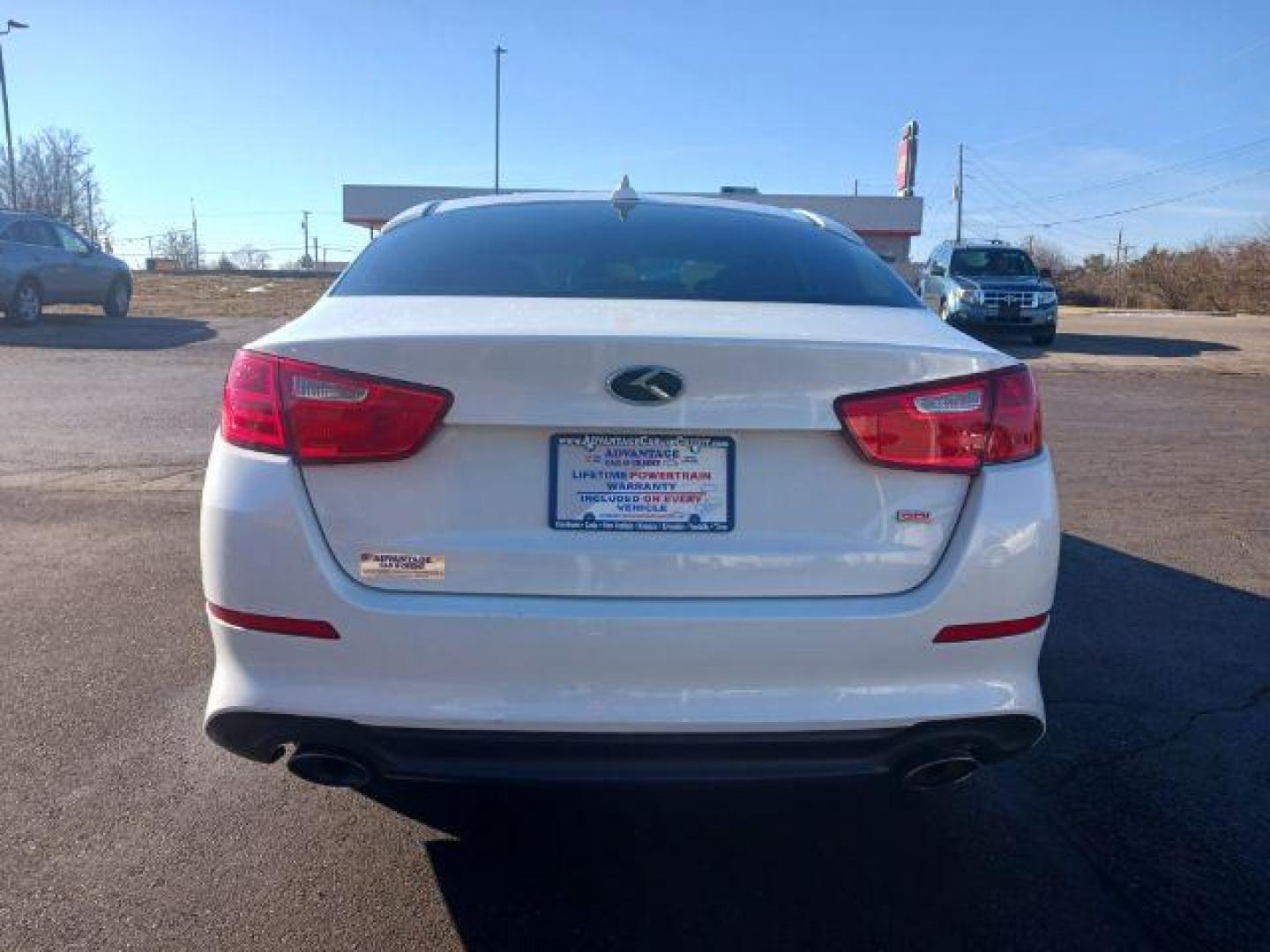 2014 Snow White Pearl Kia Optima LX (5XXGM4A71EG) with an 2.4L L4 DOHC 16V engine, 6-Speed Automatic transmission, located at 1099 N County Rd 25A , Troy, OH, 45373, (937) 908-9800, 40.057079, -84.212883 - Photo#5