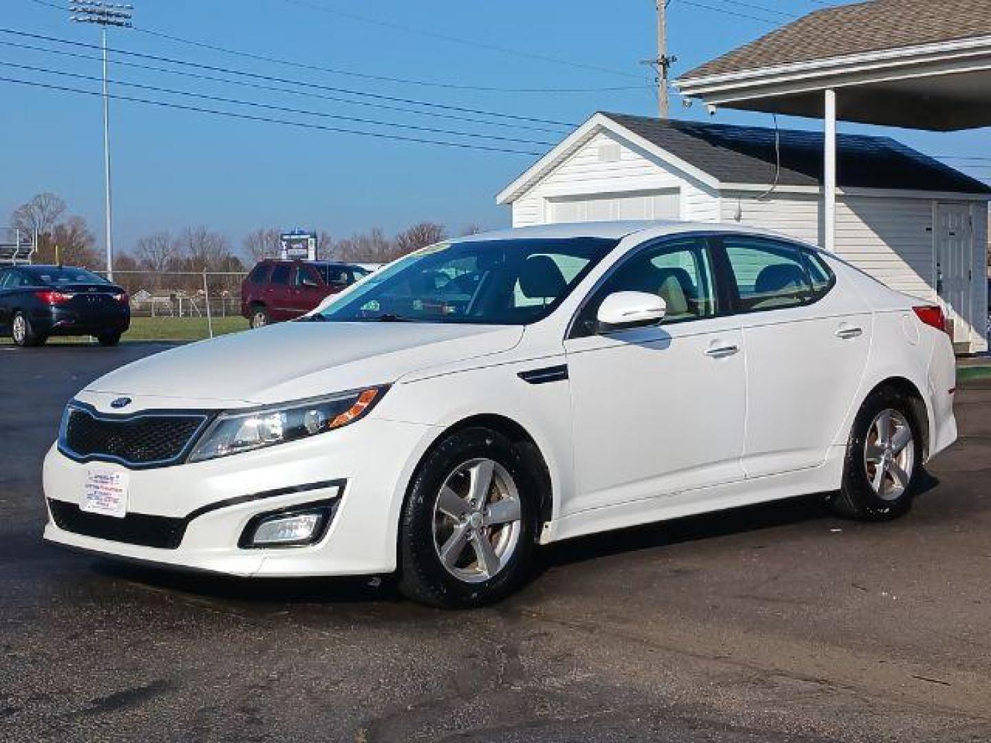 2014 Snow White Pearl Kia Optima LX (5XXGM4A75EG) with an 2.4L L4 DOHC 16V engine, 6-Speed Automatic transmission, located at 4508 South Dixie Dr, Moraine, OH, 45439, (937) 908-9800, 39.689976, -84.218452 - Photo#2