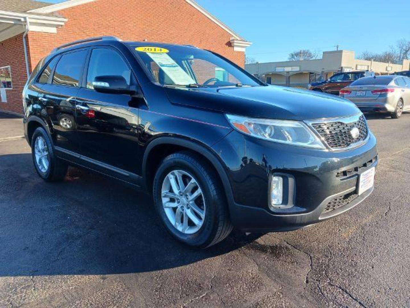 2014 Black Kia Sorento LX 2WD (5XYKT4A60EG) with an 2.4L L4 DOHC 16V engine, 6-Speed Automatic transmission, located at 1951 S Dayton Lakeview Rd., New Carlisle, OH, 45344, (937) 908-9800, 39.890999, -84.050255 - Photo#0