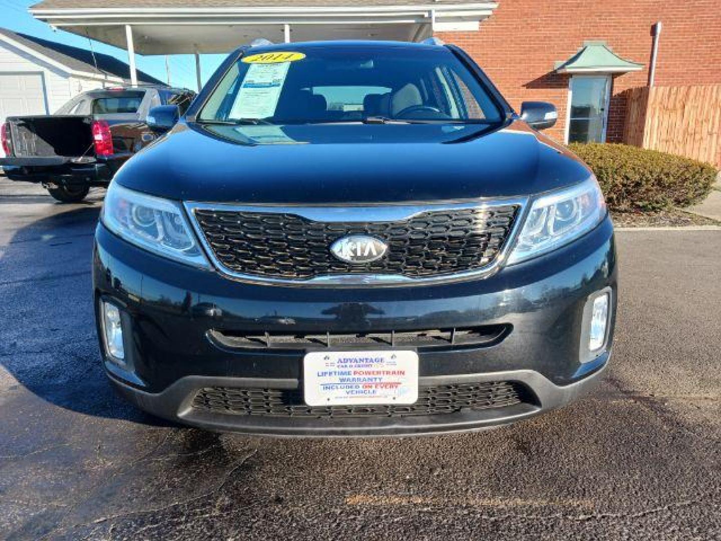 2014 Black Kia Sorento LX 2WD (5XYKT4A60EG) with an 2.4L L4 DOHC 16V engine, 6-Speed Automatic transmission, located at 1951 S Dayton Lakeview Rd., New Carlisle, OH, 45344, (937) 908-9800, 39.890999, -84.050255 - Photo#1