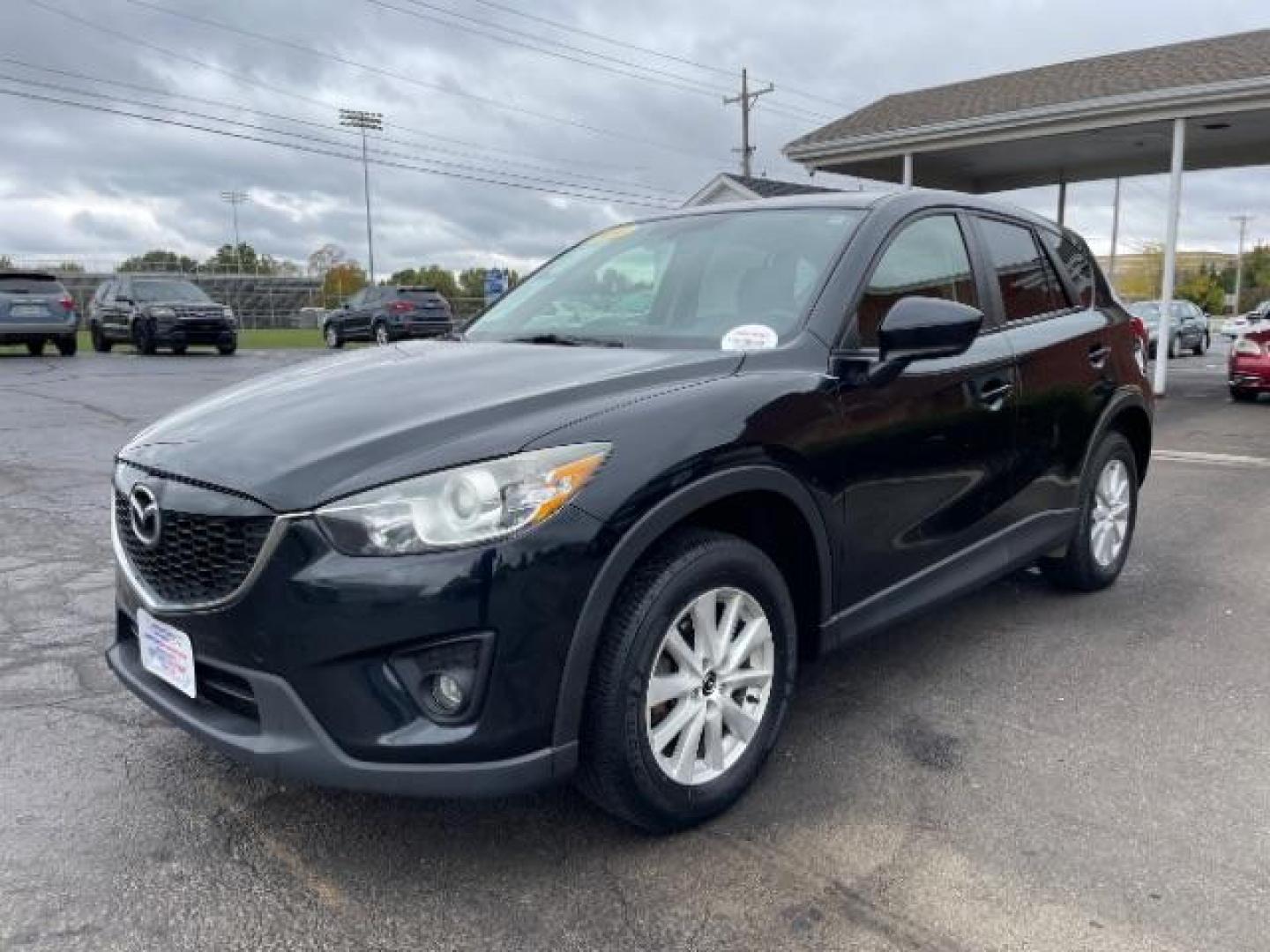 2014 Jet Black Mica Mazda CX-5 Touring AWD (JM3KE4CY2E0) with an 2.5L L4 DOHC 16V engine, 6-Speed Automatic transmission, located at 1230 East Main St, Xenia, OH, 45385, (937) 908-9800, 39.688026, -83.910172 - Photo#1