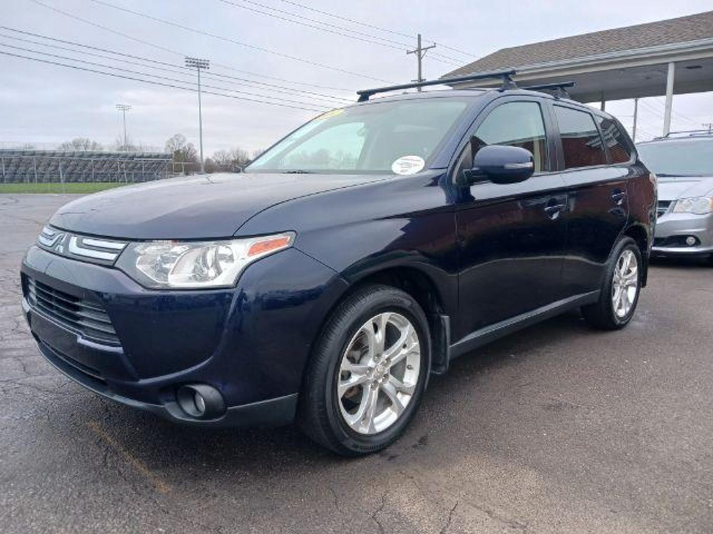 2014 Cosmic Blue Metallic Mitsubishi Outlander SE S-AWC (JA4AZ3A32EZ) with an 2.4L L4 DOHC 16V engine, 6-Speed Automatic transmission, located at 4508 South Dixie Dr, Moraine, OH, 45439, (937) 908-9800, 39.689976, -84.218452 - Photo#2