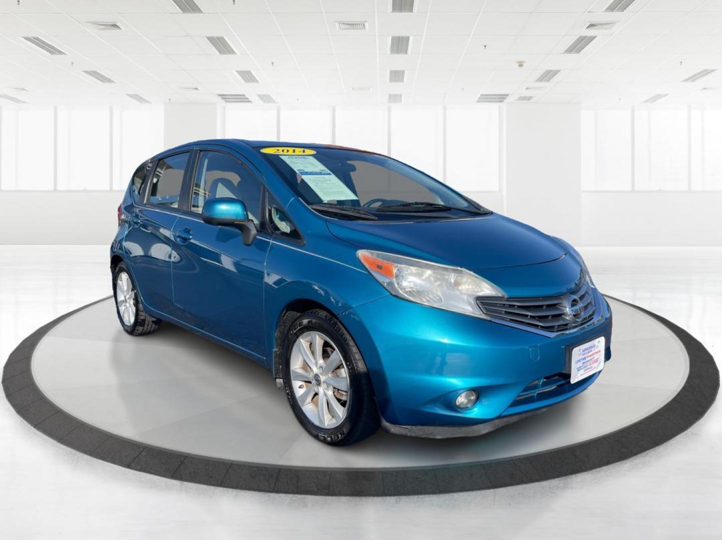 2014 Metallic Blue Nissan Versa Note S (3N1CE2CP8EL) with an 1.6L L4 DOHC 16V engine, 5-Speed Manual transmission, located at 1951 S Dayton Lakeview Rd., New Carlisle, OH, 45344, (937) 908-9800, 39.890999, -84.050255 - Photo#0