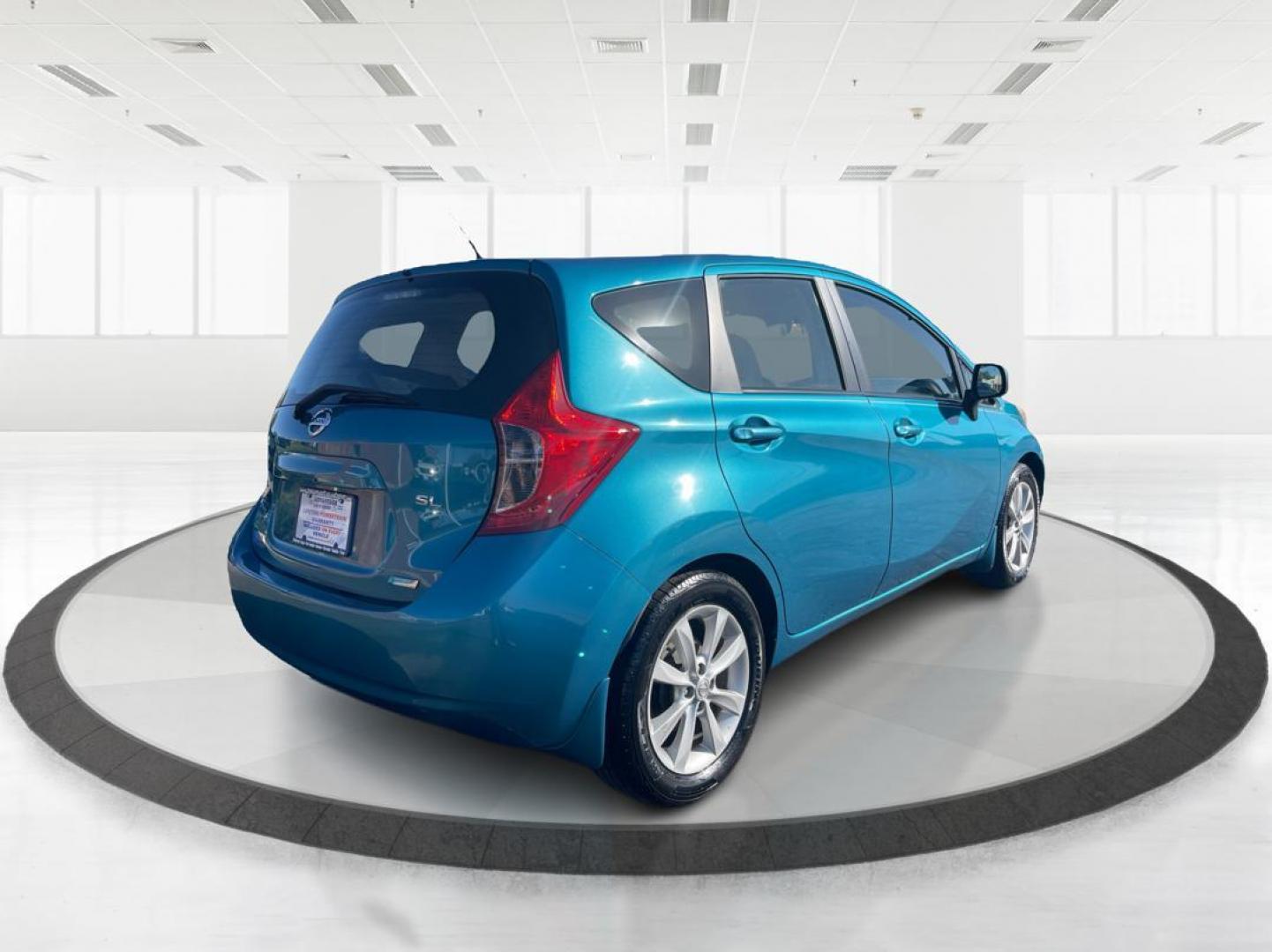 2014 Metallic Blue Nissan Versa Note S (3N1CE2CP8EL) with an 1.6L L4 DOHC 16V engine, 5-Speed Manual transmission, located at 1951 S Dayton Lakeview Rd., New Carlisle, OH, 45344, (937) 908-9800, 39.890999, -84.050255 - Photo#2