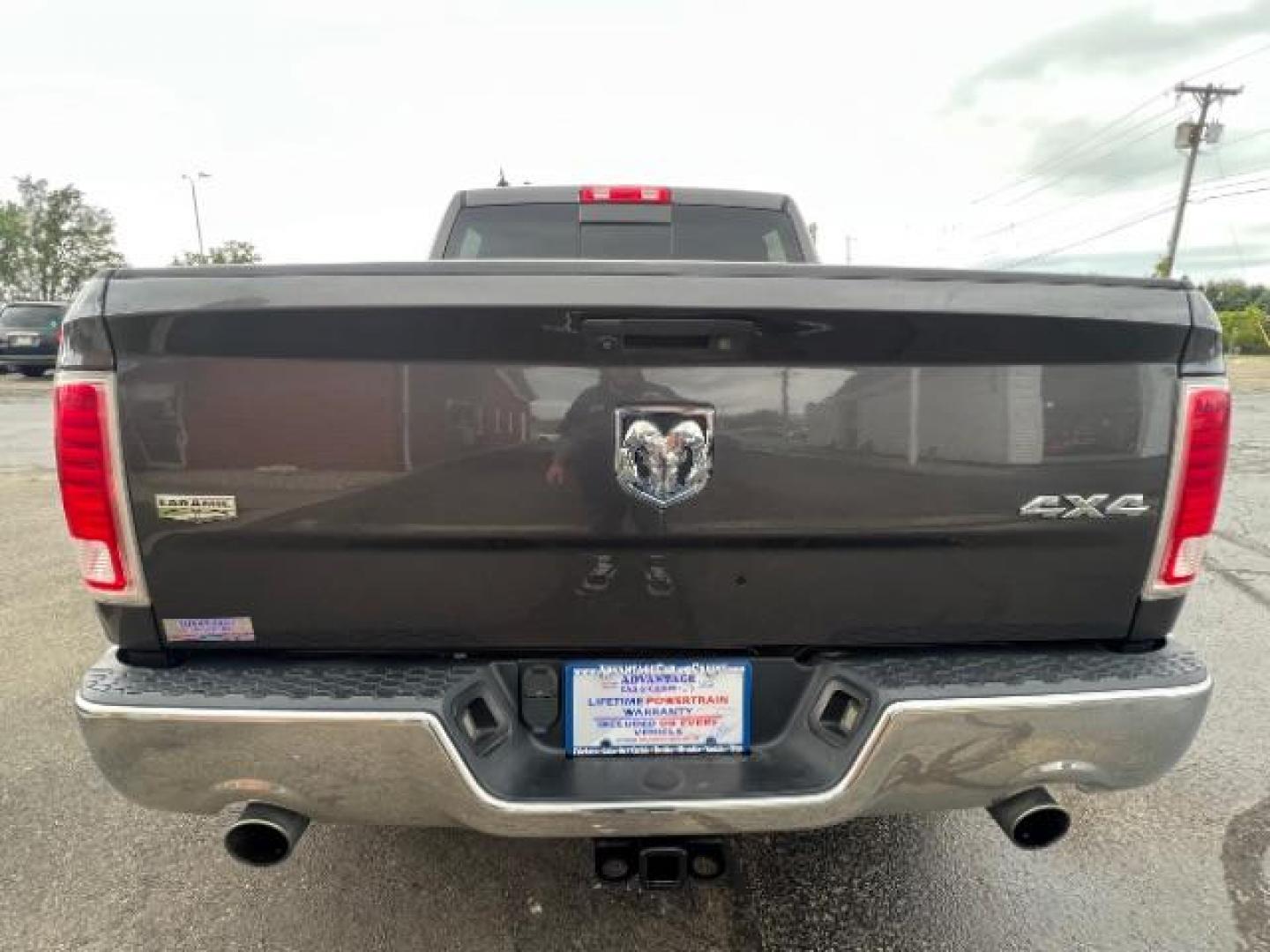 2014 Granite Crystal Met CC RAM 1500 Laramie Crew Cab SWB 4WD (1C6RR7NTXES) with an 5.7L V8 OHV 16V engine, 8-Speed Automatic transmission, located at 1184 Kauffman Ave, Fairborn, OH, 45324, (937) 908-9800, 39.807072, -84.030914 - Photo#4