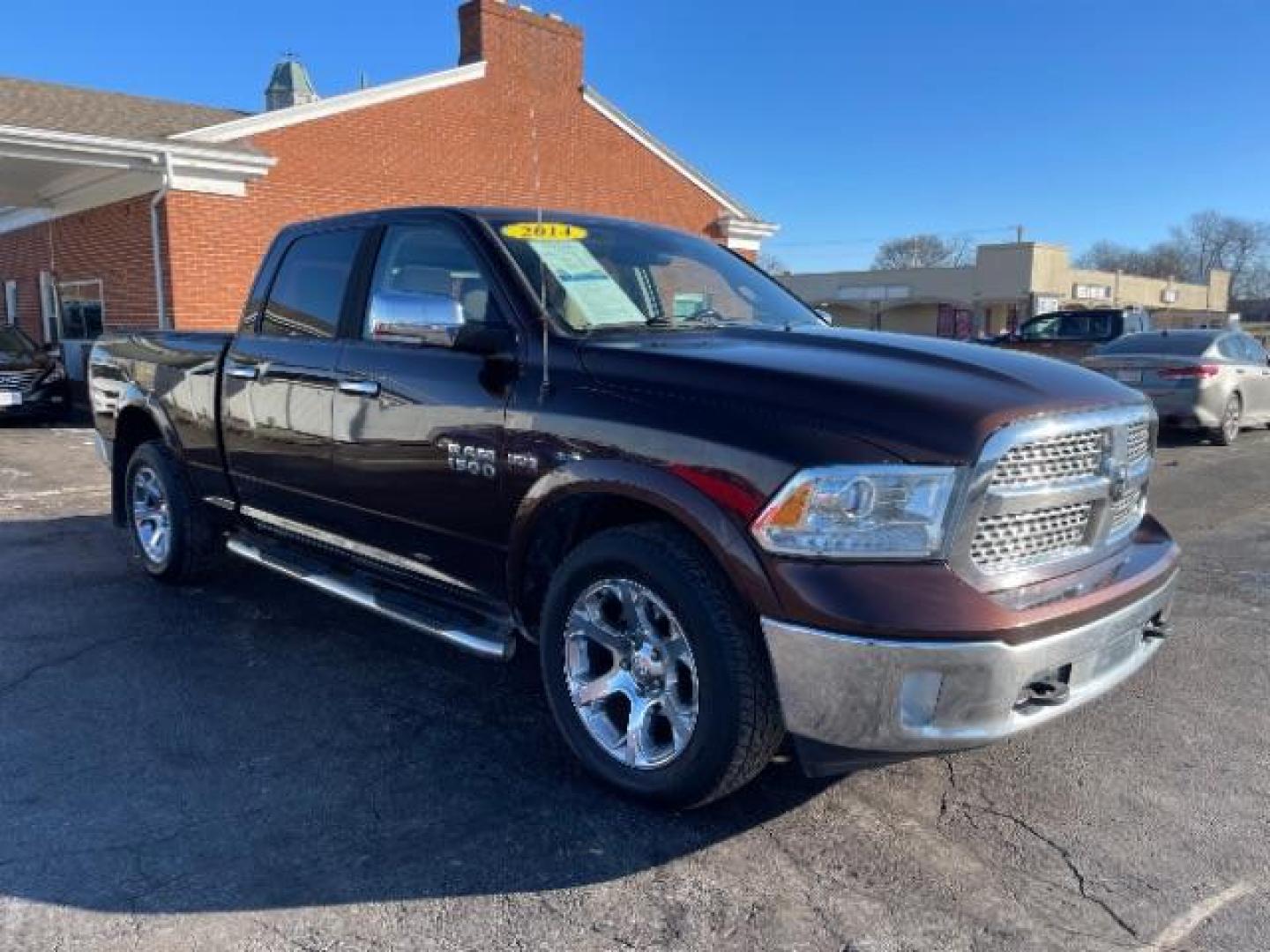 2014 Western Brown RAM 1500 Laramie Crew Cab LWB 4WD (1C6RR7VT1ES) with an 5.7L V8 OHV 16V engine, 8-Speed Automatic transmission, located at 1951 S Dayton Lakeview Rd., New Carlisle, OH, 45344, (937) 908-9800, 39.890999, -84.050255 - Photo#0