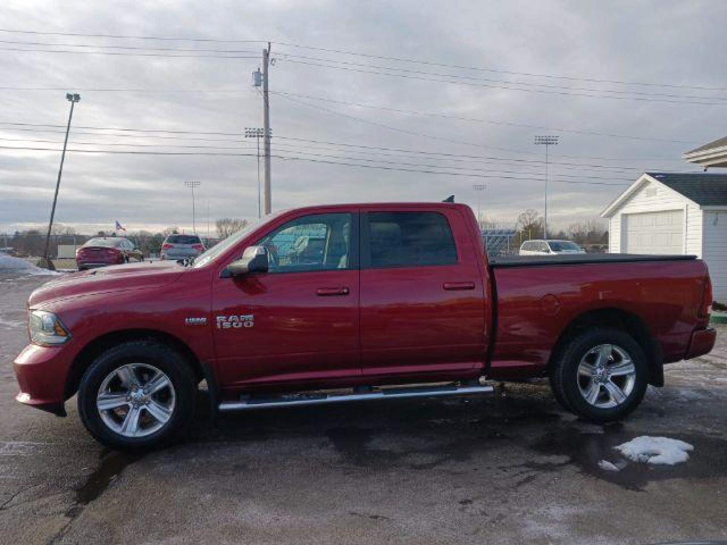 2014 Dp Cherry Red Crystal PC RAM 1500 Sport Crew Cab LWB 4WD (1C6RR7UT5ES) with an 5.7L V8 OHV 16V engine, 8-Speed Automatic transmission, located at 1230 East Main St, Xenia, OH, 45385, (937) 908-9800, 39.688026, -83.910172 - Photo#3