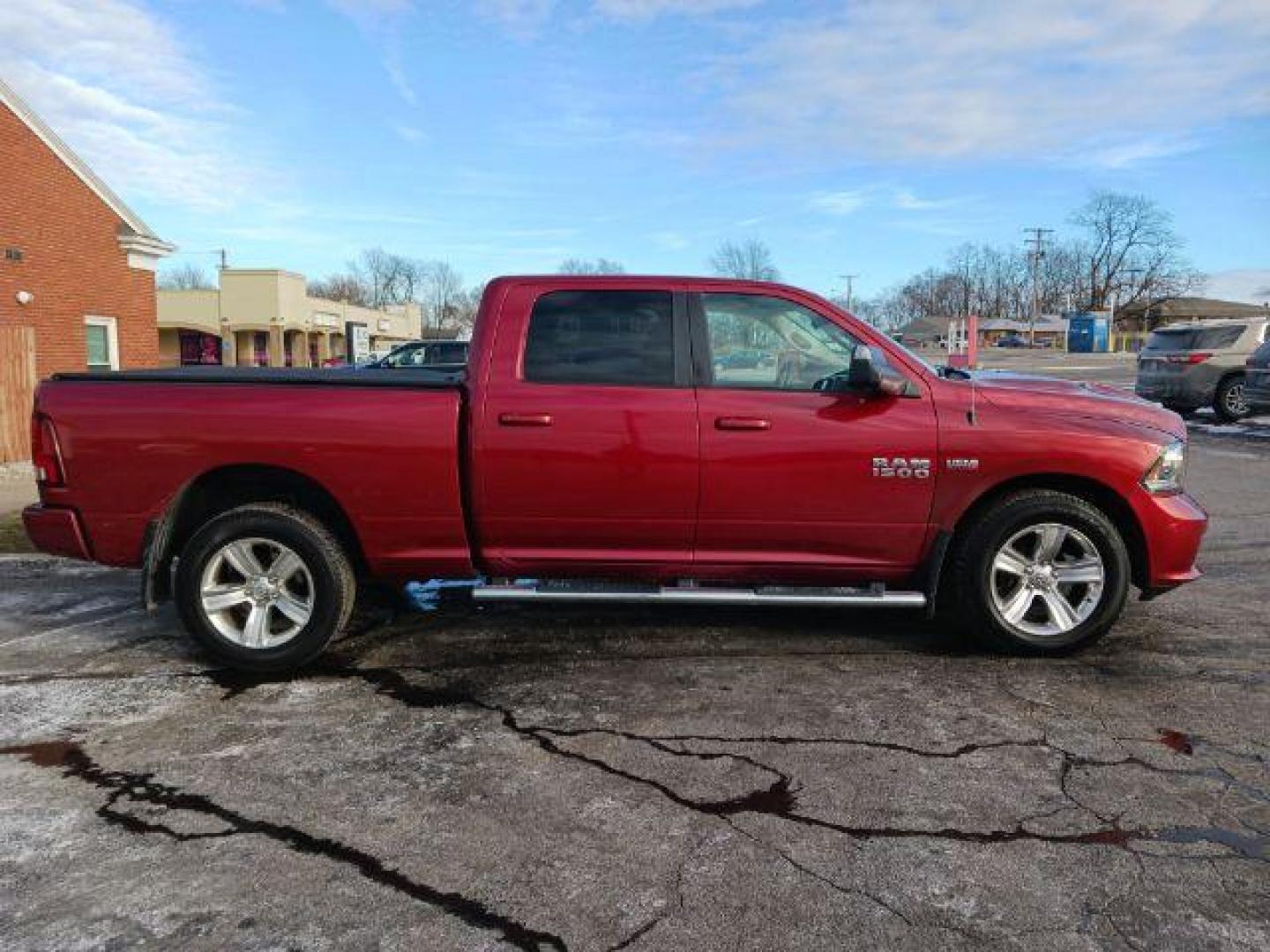 2014 Dp Cherry Red Crystal PC RAM 1500 Sport Crew Cab LWB 4WD (1C6RR7UT5ES) with an 5.7L V8 OHV 16V engine, 8-Speed Automatic transmission, located at 1230 East Main St, Xenia, OH, 45385, (937) 908-9800, 39.688026, -83.910172 - Photo#4