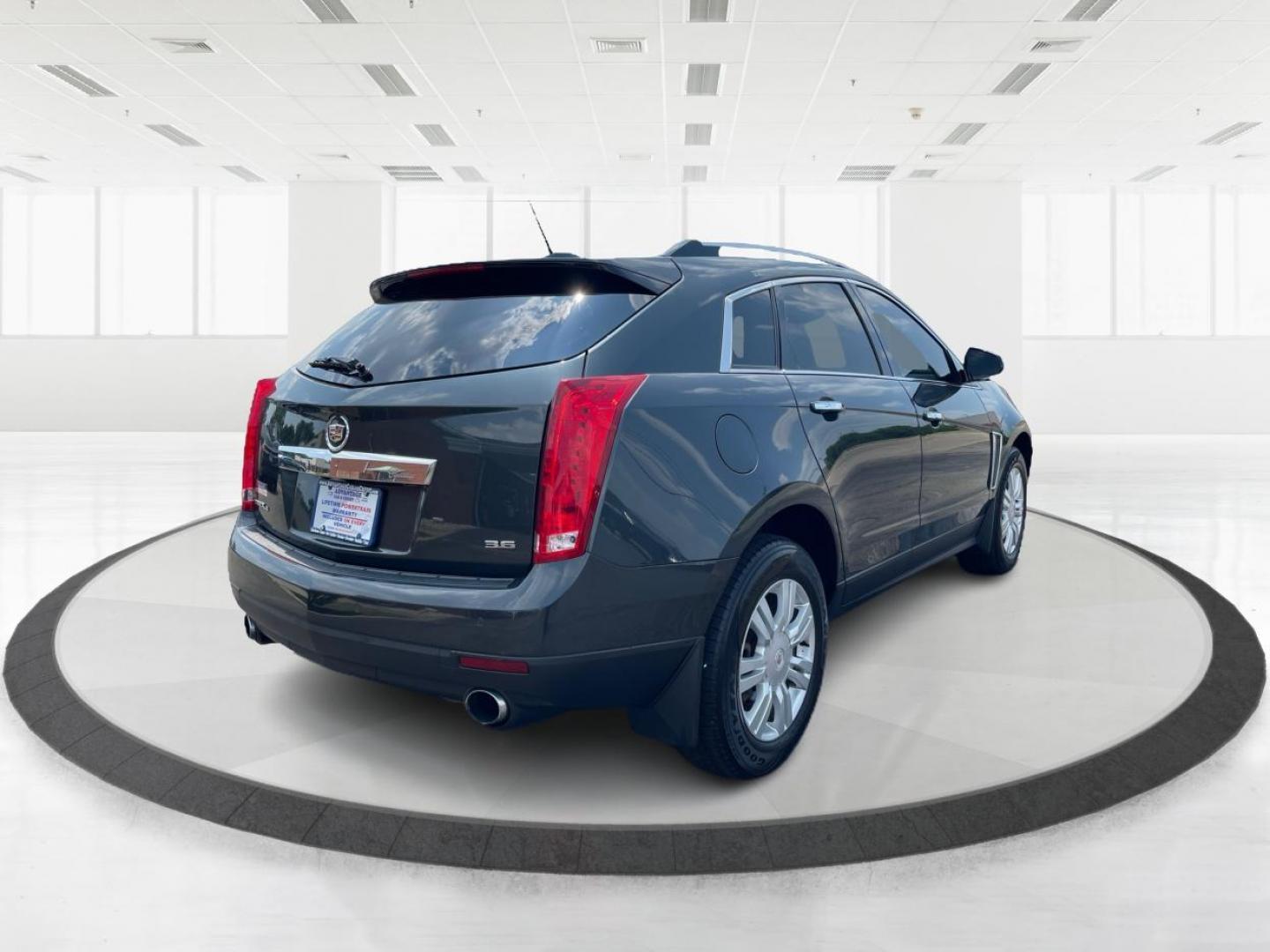 2015 Graphite Metallic Cadillac SRX Luxury Collection AWD (3GYFNEE31FS) with an 3.6L V6 DOHC 24V FFV engine, 6-Speed Automatic transmission, located at 1951 S Dayton Lakeview Rd., New Carlisle, OH, 45344, (937) 908-9800, 39.890999, -84.050255 - Photo#2