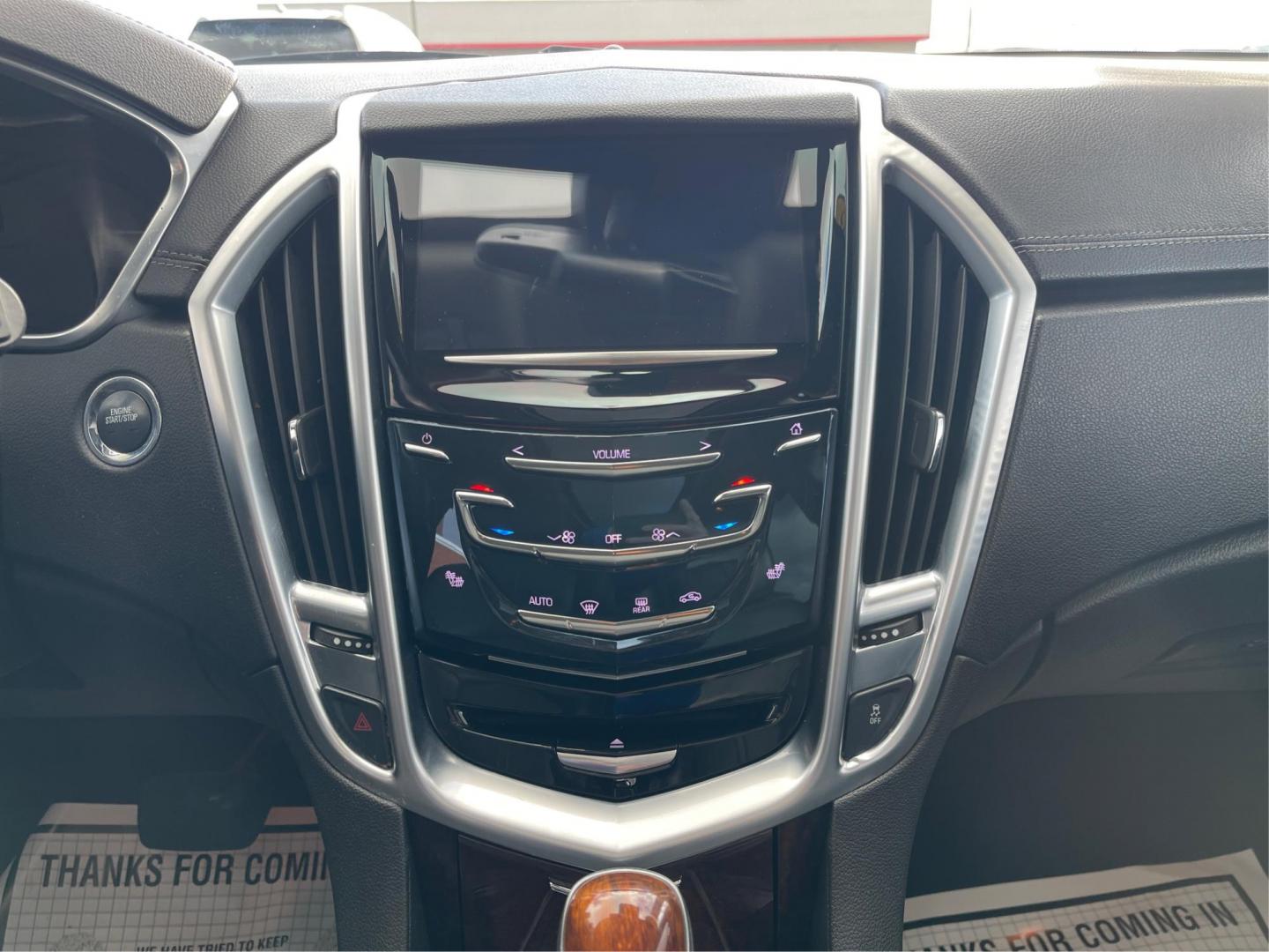 2015 Graphite Metallic Cadillac SRX Luxury Collection FWD (3GYFNBE3XFS) with an 3.6L V6 DOHC 24V FFV engine, 6-Speed Automatic transmission, located at 880 E. National Road, Vandalia, OH, 45377, (937) 908-9800, 39.891918, -84.183594 - 2015 Cadillac SRX Luxury Collection FWD - Photo#12