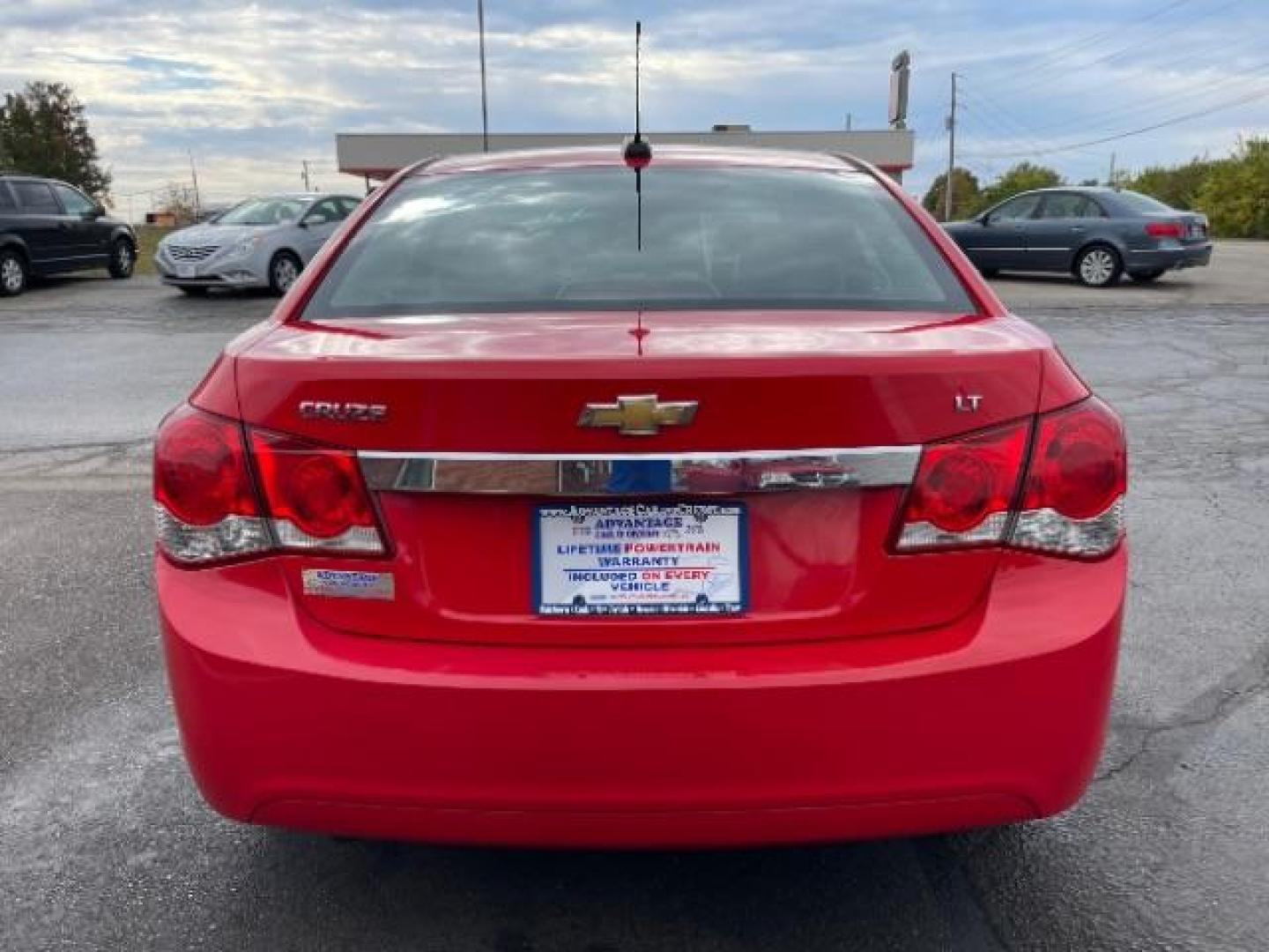 2015 Red Hot Chevrolet Cruze 2LT Auto (1G1PE5SB2F7) with an 1.4L L4 DOHC 16V TURBO engine, 6-Speed Automatic transmission, located at 1184 Kauffman Ave, Fairborn, OH, 45324, (937) 908-9800, 39.807072, -84.030914 - Photo#4