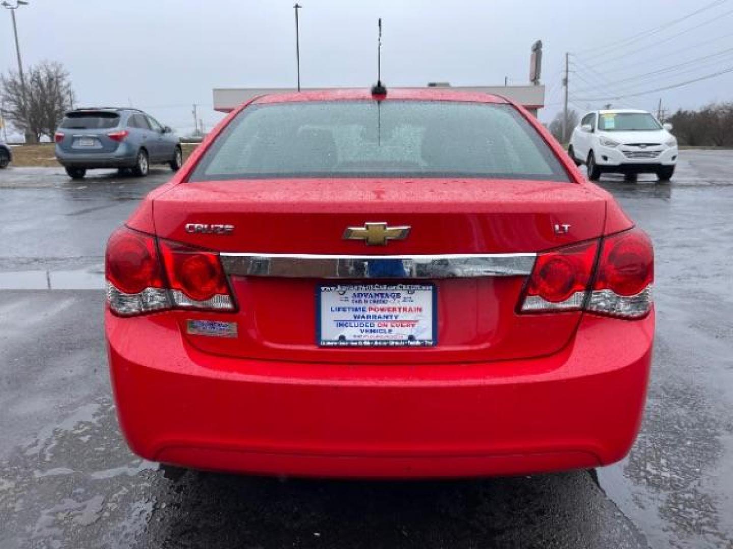 2015 Red Hot Chevrolet Cruze 1LT Auto (1G1PC5SB5F7) with an 1.4L L4 DOHC 16V TURBO engine, 6-Speed Automatic transmission, located at 1184 Kauffman Ave, Fairborn, OH, 45324, (937) 908-9800, 39.807072, -84.030914 - Photo#4