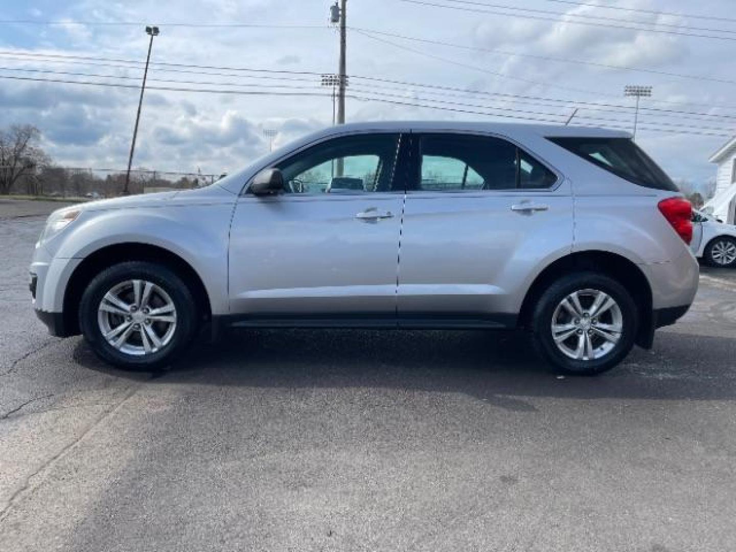 2015 Silver Ice Metallic Chevrolet Equinox LS AWD (2GNFLEEK9F6) with an 2.4L L4 DOHC 16V FFV engine, 6-Speed Automatic transmission, located at 1099 N County Rd 25A , Troy, OH, 45373, (937) 908-9800, 40.057079, -84.212883 - Photo#4