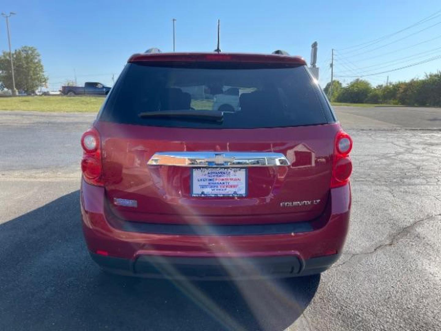 2015 Crystal Red Tintcoat Chevrolet Equinox 1LT 2WD (2GNALBEK3F1) with an 2.4L L4 DOHC 16V FFV engine, 6-Speed Automatic transmission, located at 4508 South Dixie Dr, Moraine, OH, 45439, (937) 908-9800, 39.689976, -84.218452 - Photo#4