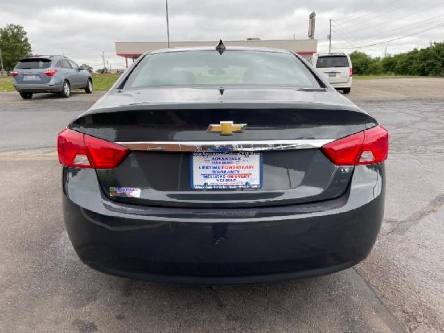 2015 Black Chevrolet Impala LS (2G11Z5SL6F9) with an 2.5L L4 DOHC 16V engine, 6-Speed Automatic transmission, located at 1099 N County Rd 25A , Troy, OH, 45373, (937) 908-9800, 40.057079, -84.212883 - Photo#4