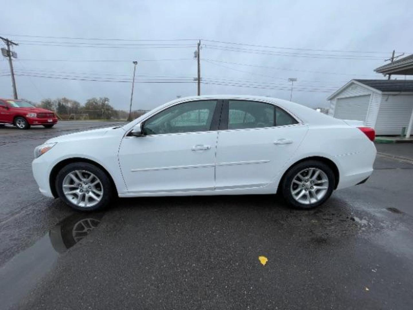 2015 Summit White Chevrolet Malibu 1LT (1G11C5SL5FF) with an 2.5L L4 DOHC 16V engine, 6-Speed Automatic transmission, located at 1184 Kauffman Ave, Fairborn, OH, 45324, (937) 908-9800, 39.807072, -84.030914 - Photo#2