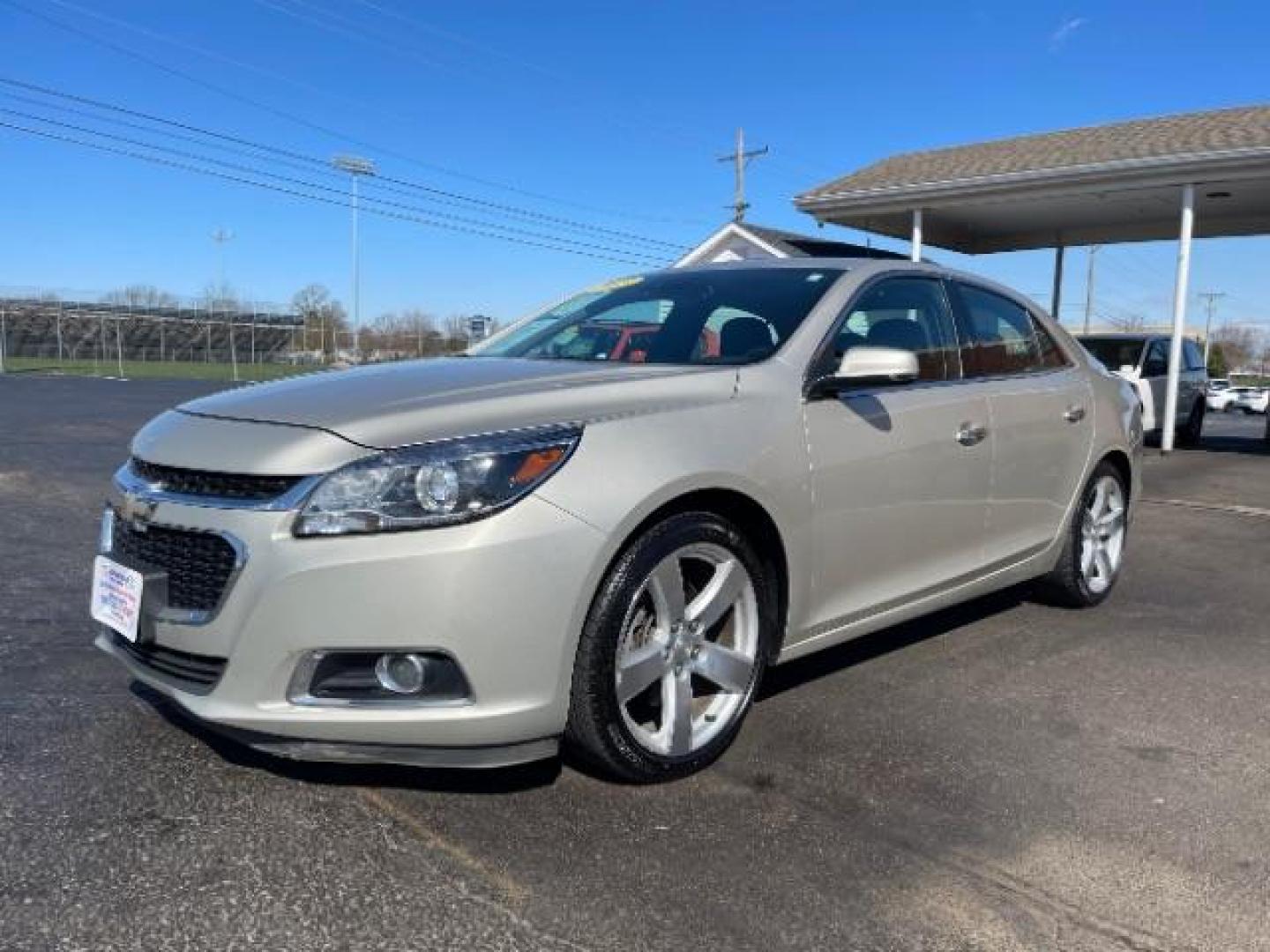 2015 Champagne Silver Metallic Chevrolet Malibu 2LTZ (1G11G5SX9FF) with an 2.0L L4 DOHC 16V engine, 6-Speed Automatic transmission, located at 1951 S Dayton Lakeview Rd., New Carlisle, OH, 45344, (937) 908-9800, 39.890999, -84.050255 - Photo#1