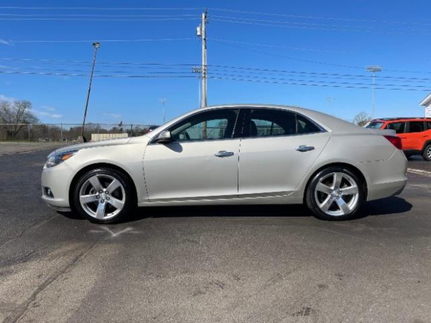 2015 Champagne Silver Metallic Chevrolet Malibu 2LTZ (1G11G5SX9FF) with an 2.0L L4 DOHC 16V engine, 6-Speed Automatic transmission, located at 1951 S Dayton Lakeview Rd., New Carlisle, OH, 45344, (937) 908-9800, 39.890999, -84.050255 - Photo#2