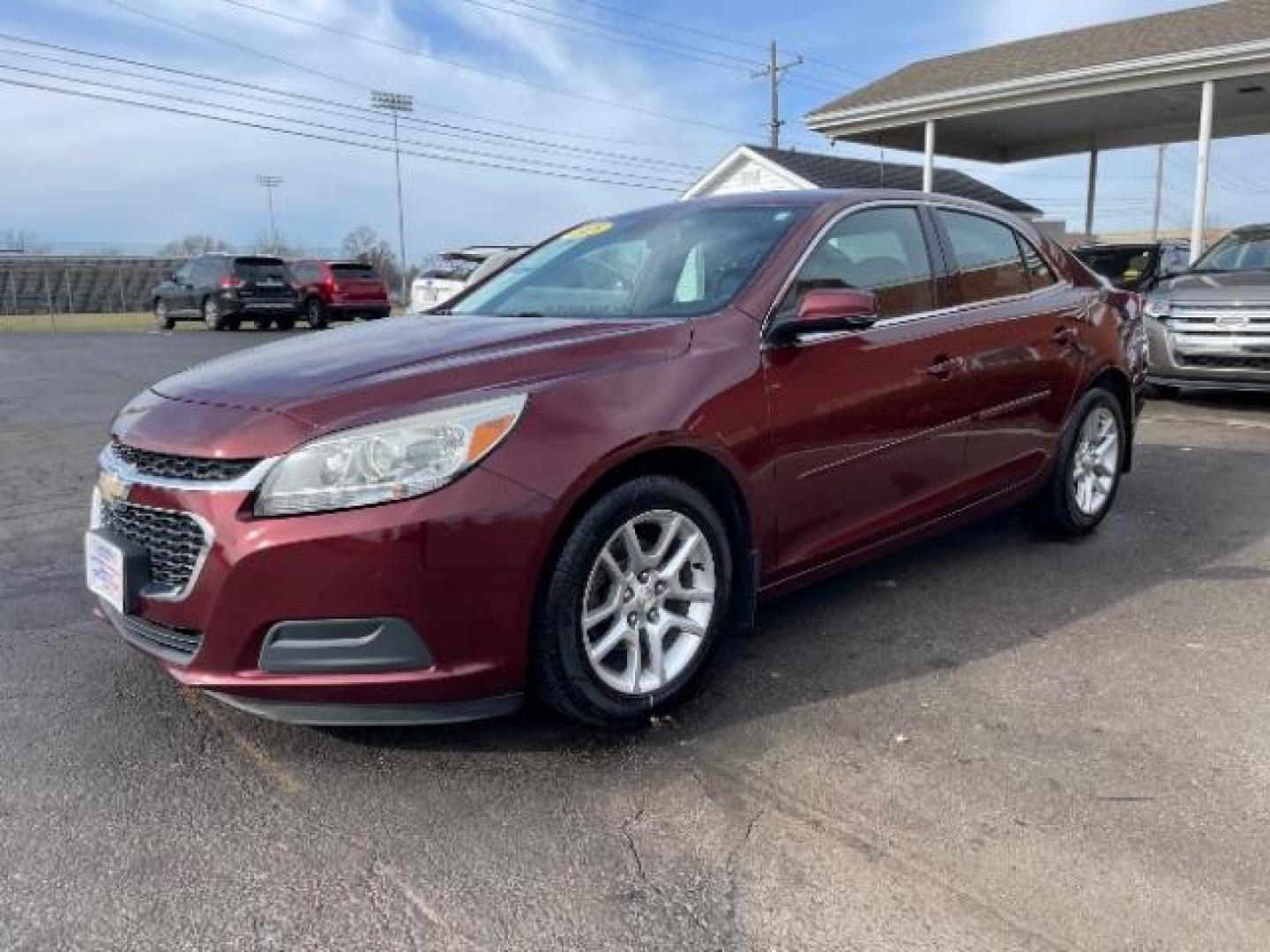 2015 Butte Red Metallic Chevrolet Malibu 1LT (1G11C5SL6FF) with an 2.5L L4 DOHC 16V engine, 6-Speed Automatic transmission, located at 1230 East Main St, Xenia, OH, 45385, (937) 908-9800, 39.688026, -83.910172 - Photo#1