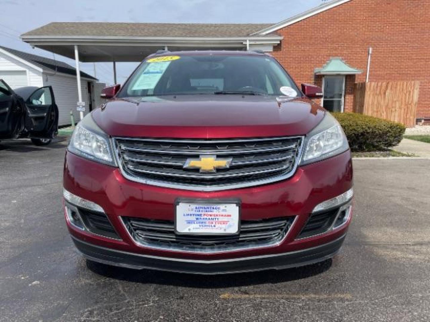 2015 Siren Red Tintcoat Chevrolet Traverse 2LT AWD (1GNKVHKD7FJ) with an 3.6L V6 DOHC 24V engine, 6-Speed Automatic transmission, located at 1099 N County Rd 25A , Troy, OH, 45373, (937) 908-9800, 40.057079, -84.212883 - Photo#2