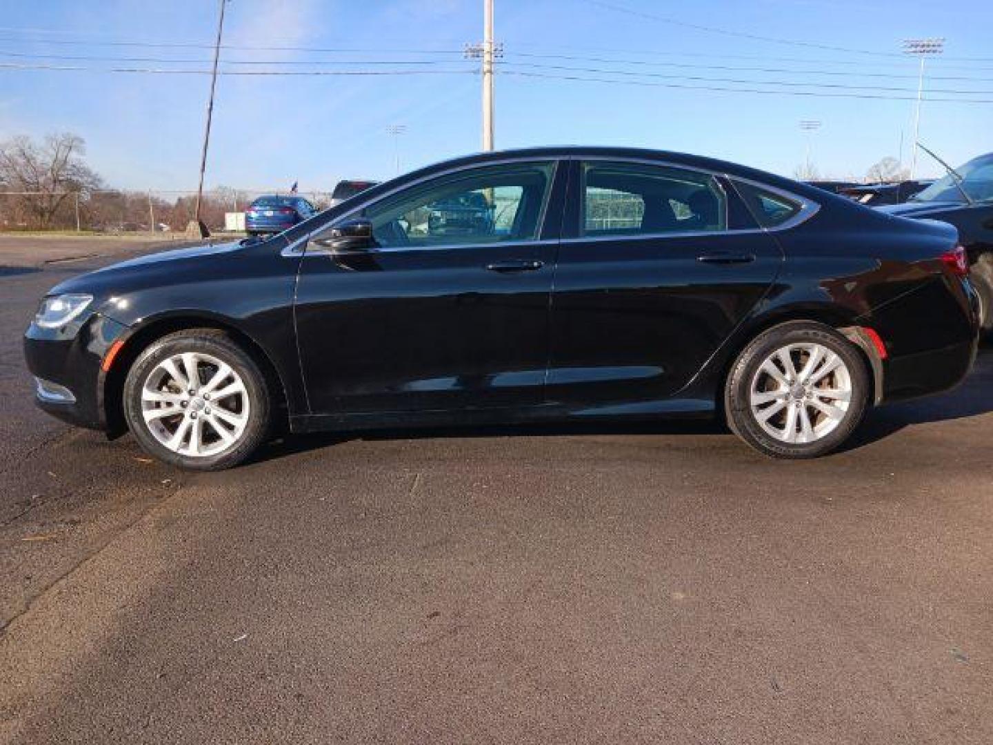 2015 Black Clearcoat Chrysler 200 Limited (1C3CCCAB3FN) with an 2.4L L4 DOHC 16V engine, 9-Speed Automatic transmission, located at 401 Woodman Dr, Riverside, OH, 45431, (937) 908-9800, 39.760899, -84.123421 - Photo#3