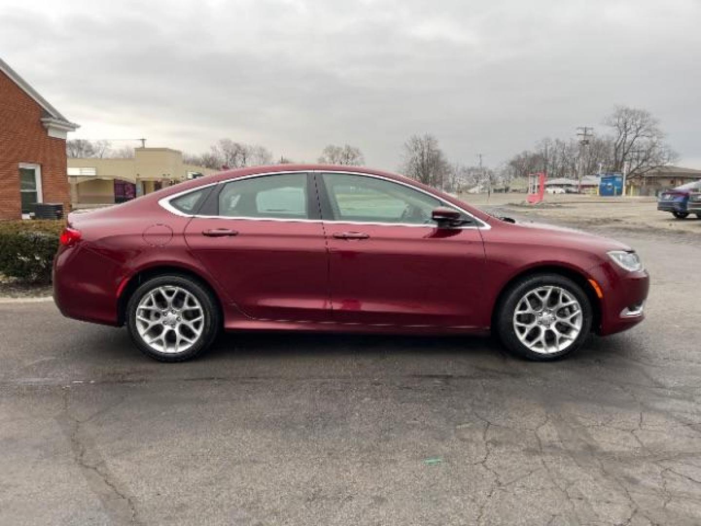 2015 Velvet Red Pearlcoat Chrysler 200 C AWD (1C3CCCEG1FN) with an 3.6L V6 DOHC 24V FFV engine, 9-Speed Automatic transmission, located at 4508 South Dixie Dr, Moraine, OH, 45439, (937) 908-9800, 39.689976, -84.218452 - Photo#3