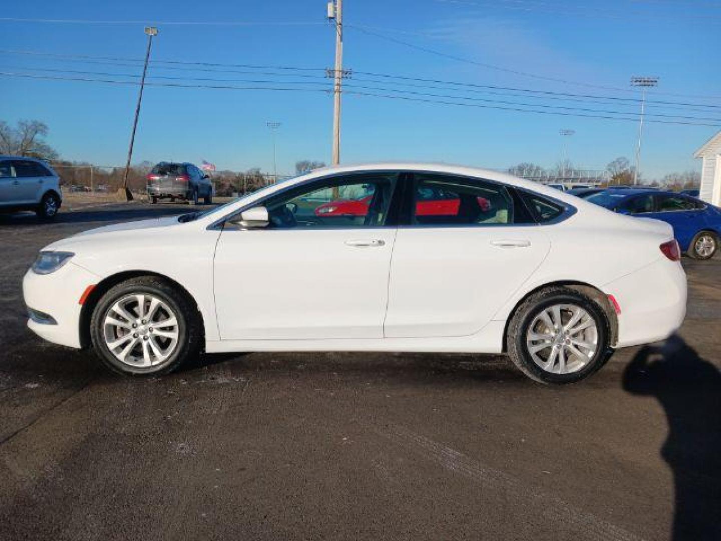 2015 Lunar White Tri-Coat Chrysler 200 Limited (1C3CCCAB9FN) with an 2.4L L4 DOHC 16V engine, 9-Speed Automatic transmission, located at 1951 S Dayton Lakeview Rd., New Carlisle, OH, 45344, (937) 908-9800, 39.890999, -84.050255 - Photo#3