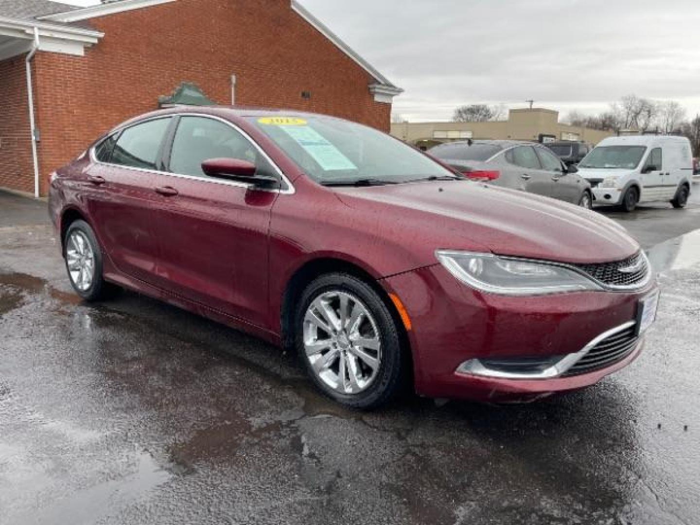 2015 Velvet Red Pearlcoat Chrysler 200 Limited (1C3CCCAB3FN) with an 2.4L L4 DOHC 16V engine, 9-Speed Automatic transmission, located at 401 Woodman Dr, Riverside, OH, 45431, (937) 908-9800, 39.760899, -84.123421 - Photo#0