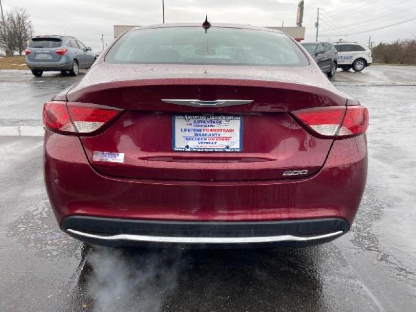 2015 Velvet Red Pearlcoat Chrysler 200 Limited (1C3CCCAB3FN) with an 2.4L L4 DOHC 16V engine, 9-Speed Automatic transmission, located at 401 Woodman Dr, Riverside, OH, 45431, (937) 908-9800, 39.760899, -84.123421 - Photo#3