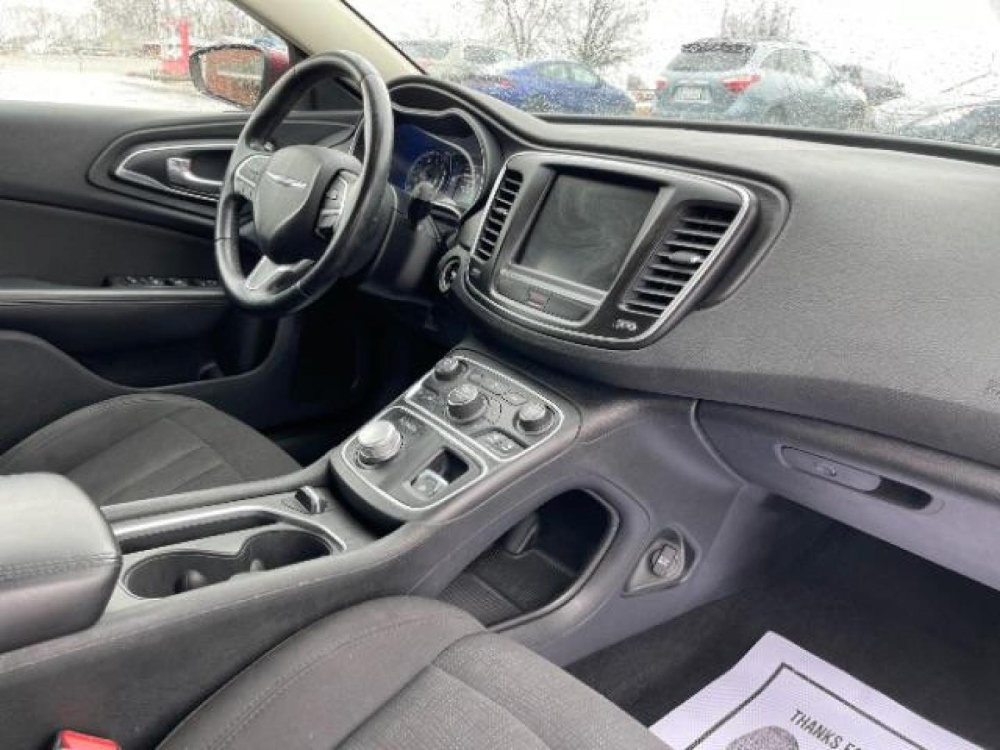 2015 Velvet Red Pearlcoat Chrysler 200 Limited (1C3CCCAB3FN) with an 2.4L L4 DOHC 16V engine, 9-Speed Automatic transmission, located at 401 Woodman Dr, Riverside, OH, 45431, (937) 908-9800, 39.760899, -84.123421 - Photo#7