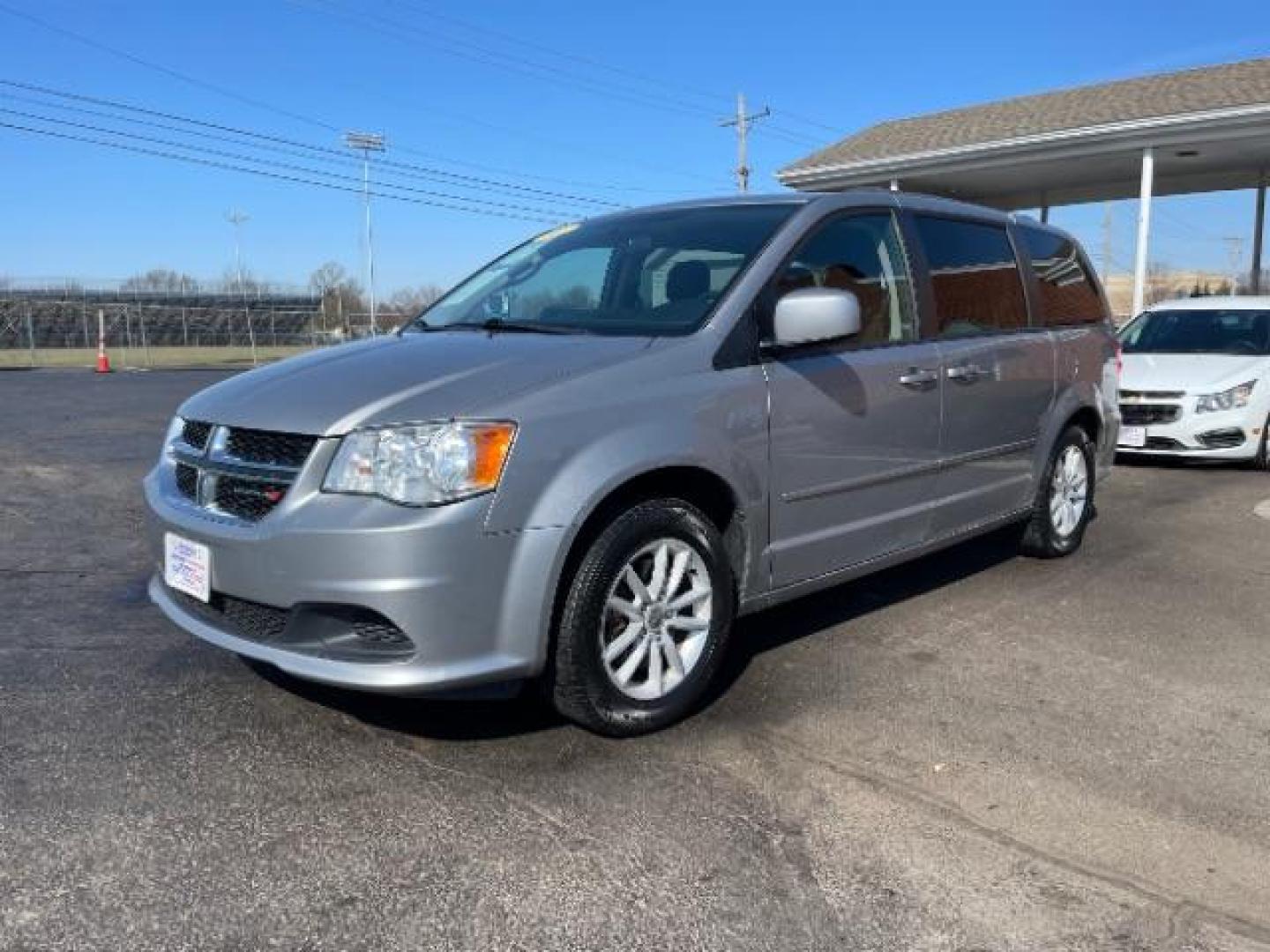 2015 Billet Silver Metallic CC Dodge Grand Caravan SXT (2C4RDGCG7FR) with an 3.6L V6 DOHC 24V engine, 6-Speed Automatic transmission, located at 880 E. National Road, Vandalia, OH, 45377, (937) 908-9800, 39.891918, -84.183594 - Photo#1