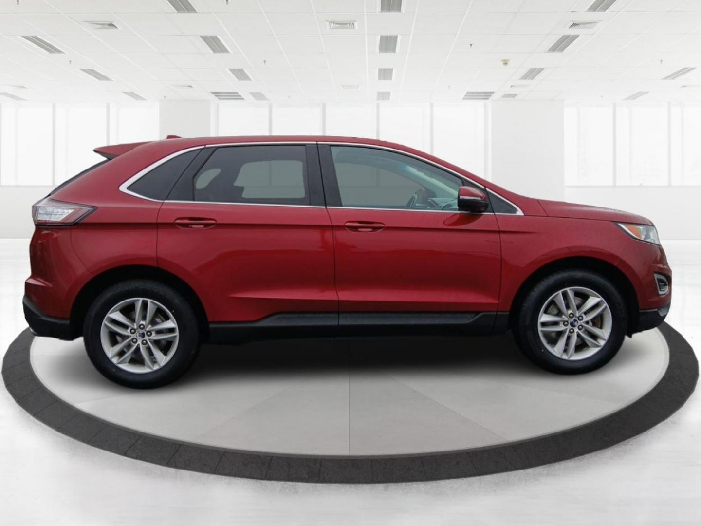 2015 Ruby Red Metallic Tinted Clearcoat Ford Edge SEL AWD (2FMTK4J84FB) with an 3.5L V6 DOHC 24V engine, 6-Speed Automatic transmission, located at 1099 N County Rd 25A , Troy, OH, 45373, (937) 908-9800, 40.057079, -84.212883 - Photo#1