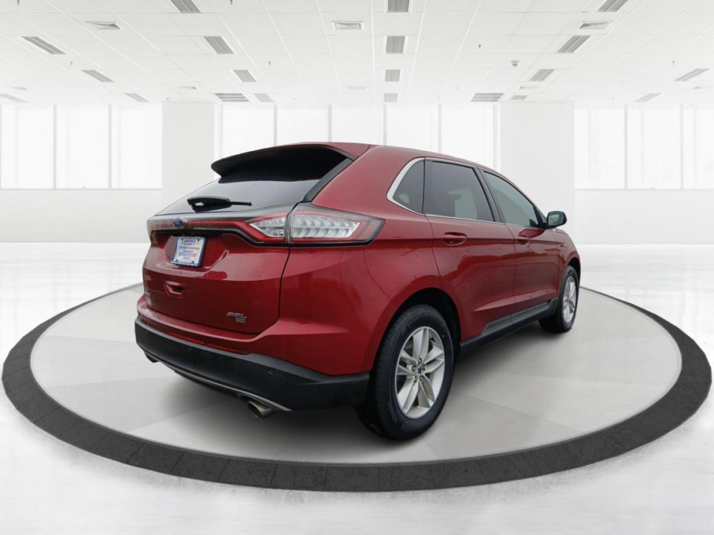 2015 Ruby Red Metallic Tinted Clearcoat Ford Edge SEL AWD (2FMTK4J84FB) with an 3.5L V6 DOHC 24V engine, 6-Speed Automatic transmission, located at 1099 N County Rd 25A , Troy, OH, 45373, (937) 908-9800, 40.057079, -84.212883 - Photo#2