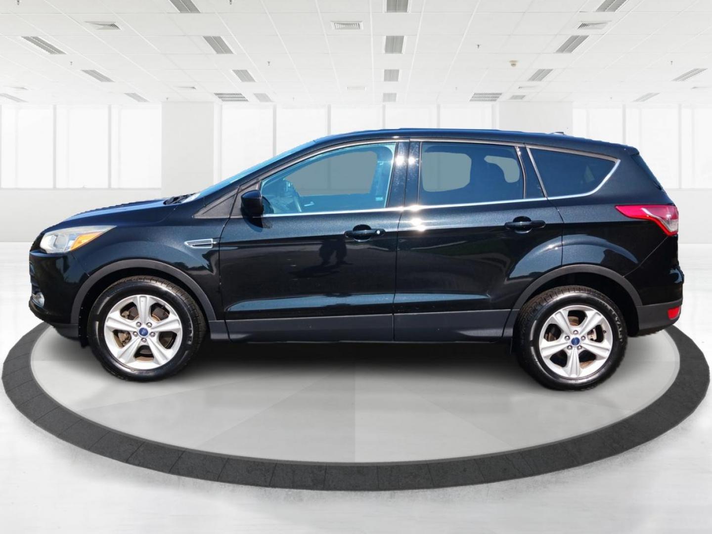 2015 Tuxedo Black Metallic Ford Escape (1FMCU9G99FU) with an 2.0L L4 DOHC 16V engine, 6-Speed Automatic transmission, located at 4508 South Dixie Dr, Moraine, OH, 45439, (937) 908-9800, 39.689976, -84.218452 - Photo#5