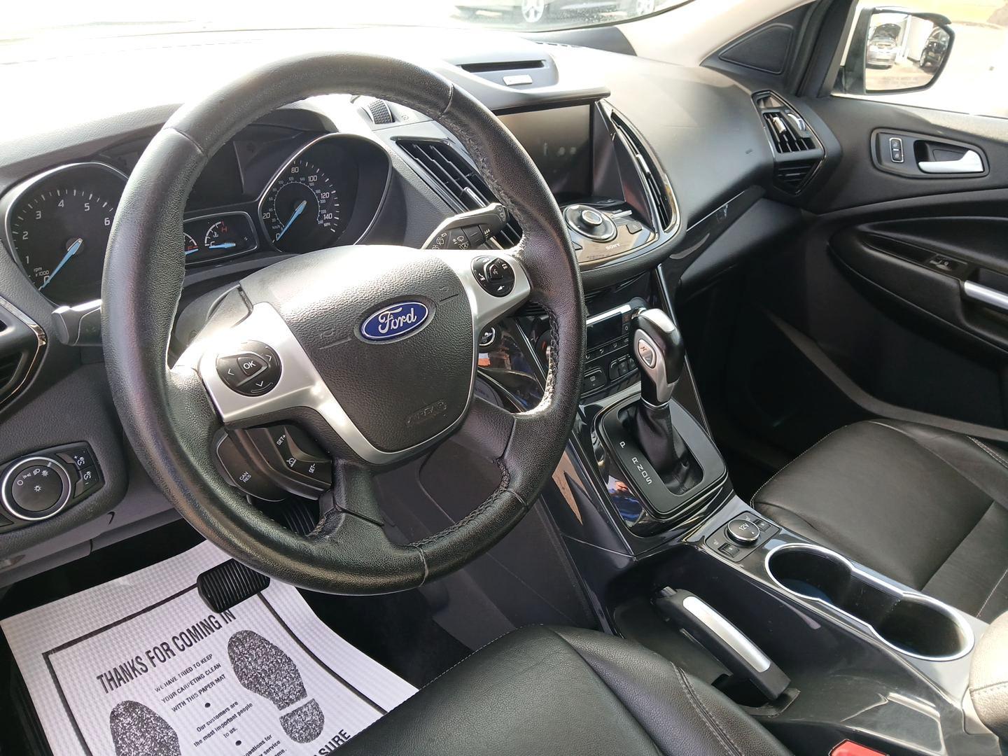 2015 White Platinum Met TC Ford Escape Titanium 4WD (1FMCU9J93FU) with an 2.0L L4 DOHC 16V engine, 6-Speed Automatic transmission, located at 1951 S Dayton Lakeview Rd., New Carlisle, OH, 45344, (937) 908-9800, 39.890999, -84.050255 - Photo#8