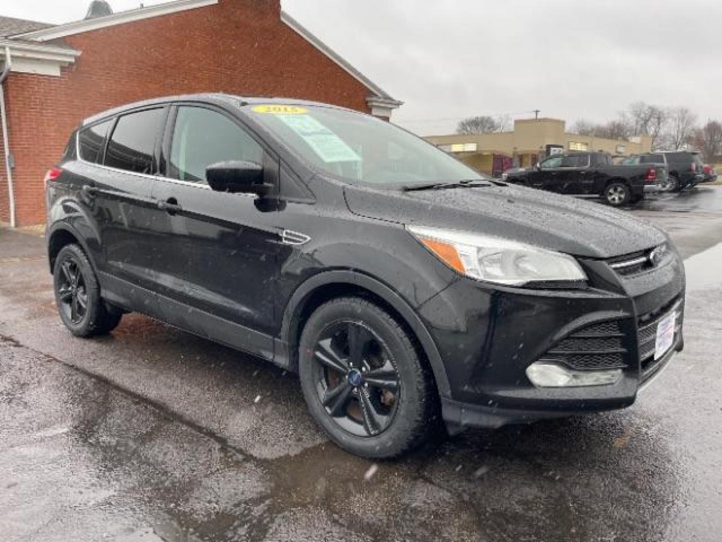 2015 Tuxedo Black Metallic Ford Escape SE FWD (1FMCU0G78FU) with an 2.5L L4 DOHC 16V engine, 6-Speed Automatic transmission, located at 1230 East Main St, Xenia, OH, 45385, (937) 908-9800, 39.688026, -83.910172 - Photo#0