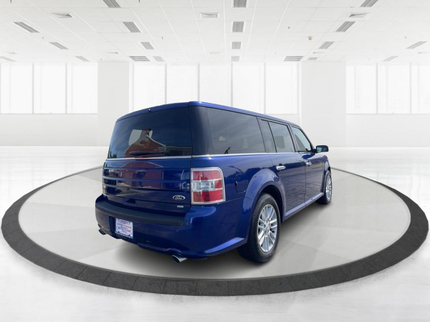 2015 Deep Impact Blue Metallic Ford Flex SEL AWD (2FMHK6C87FB) with an 3.5L V6 DOHC 24V engine, 6A transmission, located at 880 E. National Road, Vandalia, OH, 45377, (937) 908-9800, 39.891918, -84.183594 - Photo#2