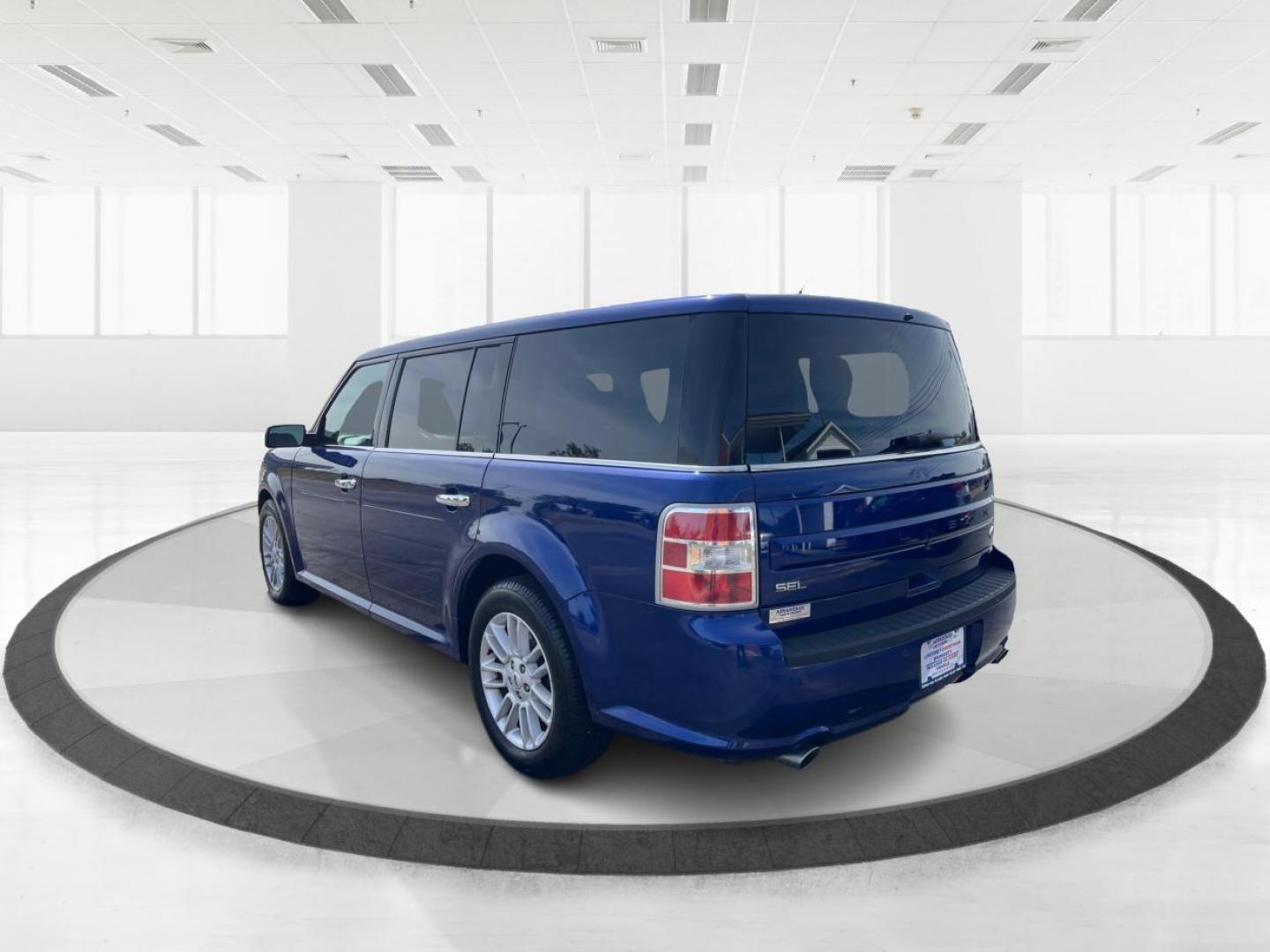 2015 Deep Impact Blue Metallic Ford Flex SEL AWD (2FMHK6C87FB) with an 3.5L V6 DOHC 24V engine, 6A transmission, located at 880 E. National Road, Vandalia, OH, 45377, (937) 908-9800, 39.891918, -84.183594 - Photo#4