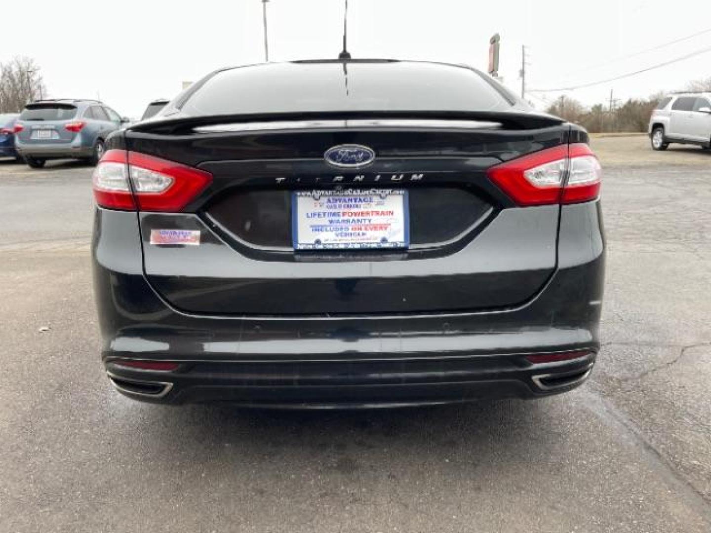 2015 Tuxedo Black Ford Fusion Titanium (3FA6P0K99FR) with an 2.0L L4 DOHC 16V engine, 6-Speed Automatic transmission, located at 401 Woodman Dr, Riverside, OH, 45431, (937) 908-9800, 39.760899, -84.123421 - Photo#5