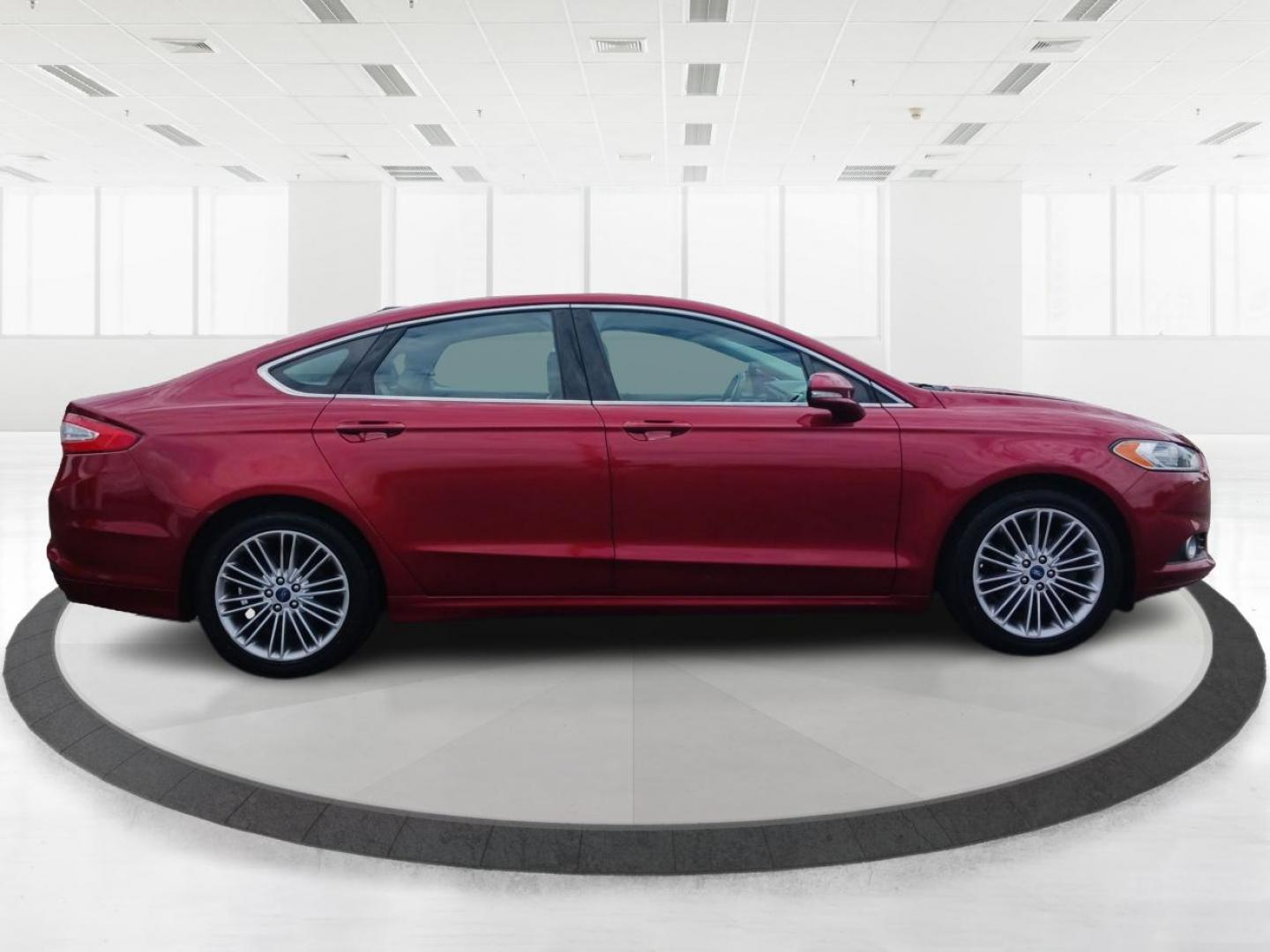 2015 Ruby Red Tinted CC Ford Fusion (3FA6P0HD2FR) with an 1.5L L4 DOHC 16V engine, 6-Speed Automatic transmission, located at 401 Woodman Dr, Riverside, OH, 45431, (937) 908-9800, 39.760899, -84.123421 - Photo#1