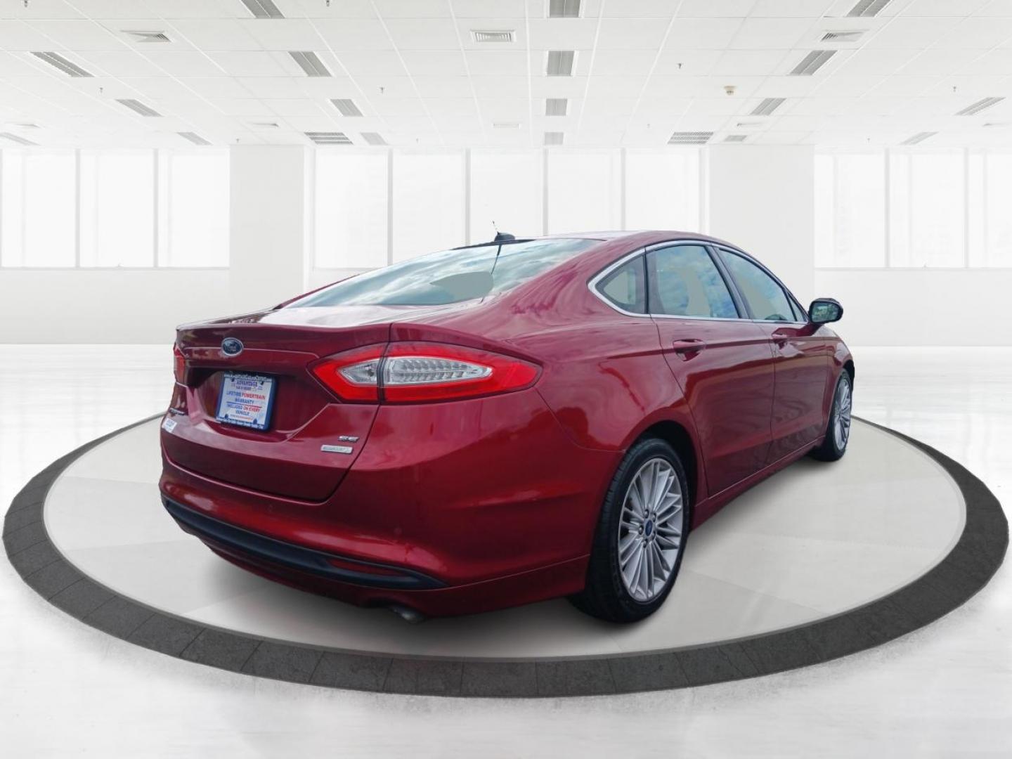 2015 Ruby Red Tinted CC Ford Fusion (3FA6P0HD2FR) with an 1.5L L4 DOHC 16V engine, 6-Speed Automatic transmission, located at 401 Woodman Dr, Riverside, OH, 45431, (937) 908-9800, 39.760899, -84.123421 - Photo#2