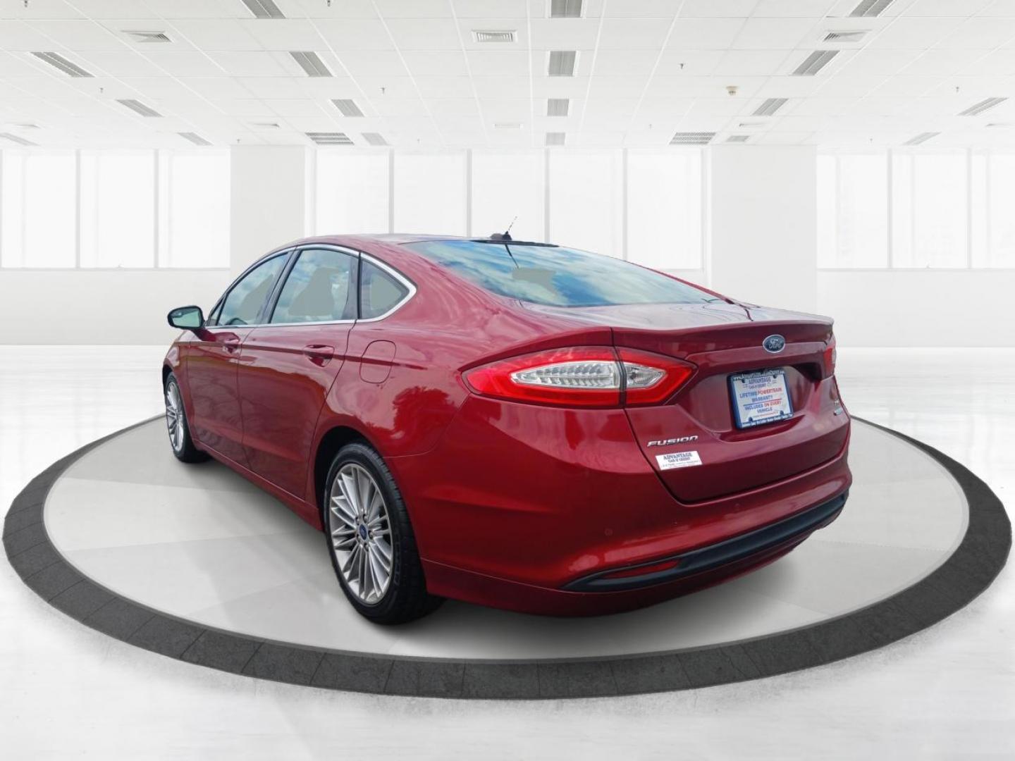 2015 Ruby Red Tinted CC Ford Fusion (3FA6P0HD2FR) with an 1.5L L4 DOHC 16V engine, 6-Speed Automatic transmission, located at 401 Woodman Dr, Riverside, OH, 45431, (937) 908-9800, 39.760899, -84.123421 - Photo#4