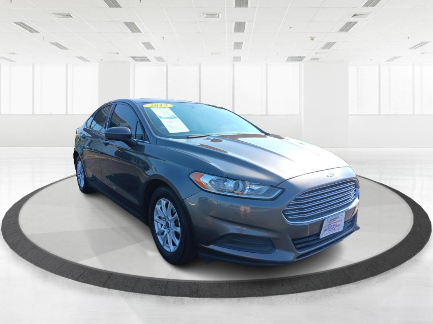 2015 Magnetic Ford Fusion (3FA6P0G78FR) with an 2.5L L4 DOHC 16V engine, 6-Speed Automatic transmission, located at 880 E. National Road, Vandalia, OH, 45377, (937) 908-9800, 39.891918, -84.183594 - Photo#0