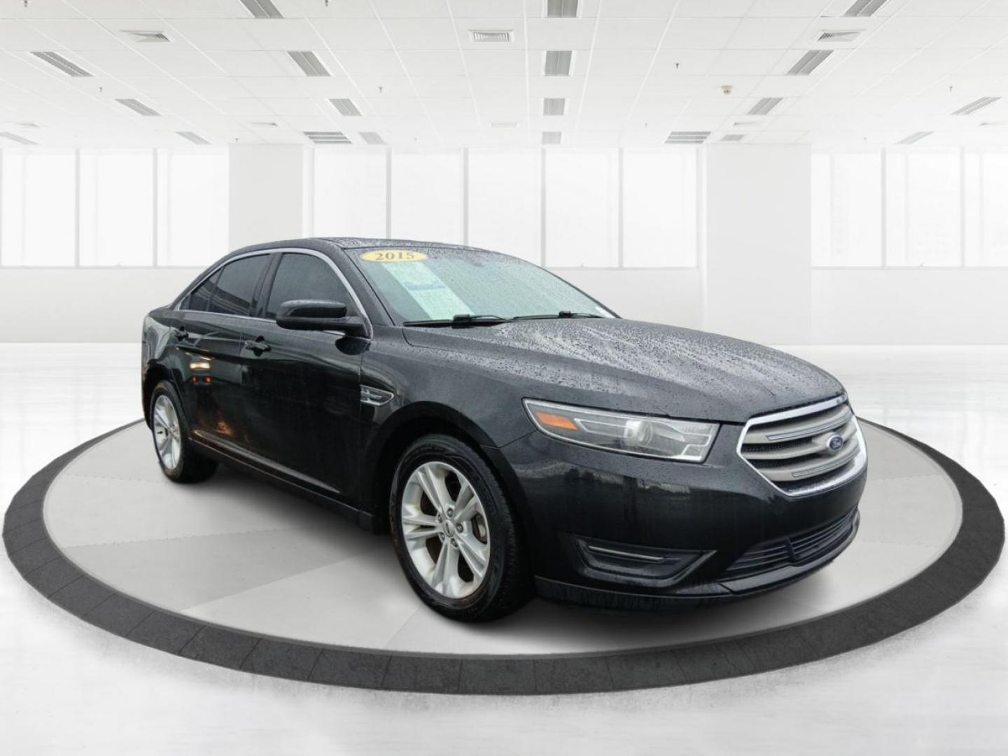 2015 Tuxedo Black Metallic Ford Taurus SEL FWD (1FAHP2E80FG) with an 3.5L V6 DOHC 24V engine, 6-Speed Automatic transmission, located at 4508 South Dixie Dr, Moraine, OH, 45439, (937) 908-9800, 39.689976, -84.218452 - Photo#0